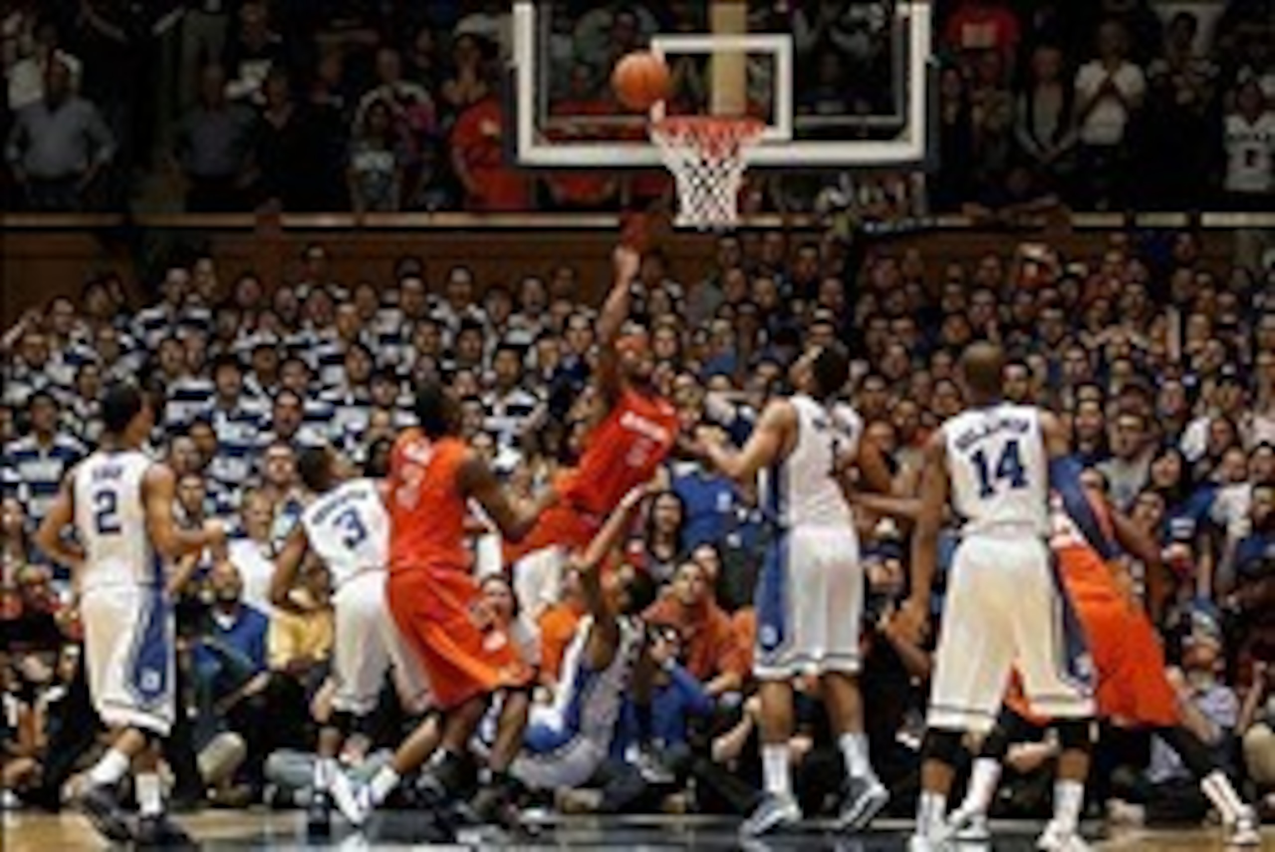 Feb 22, 2014; Durham, NC, USA; Syracuse Orange forward C.J. Fair (5) gets called for a charge as Duke Blue Devils forward Rodney Hood (5) defends near the end of their game at Cameron Indoor Stadium. Mandatory Credit: Mark Dolejs-USA TODAY Sports