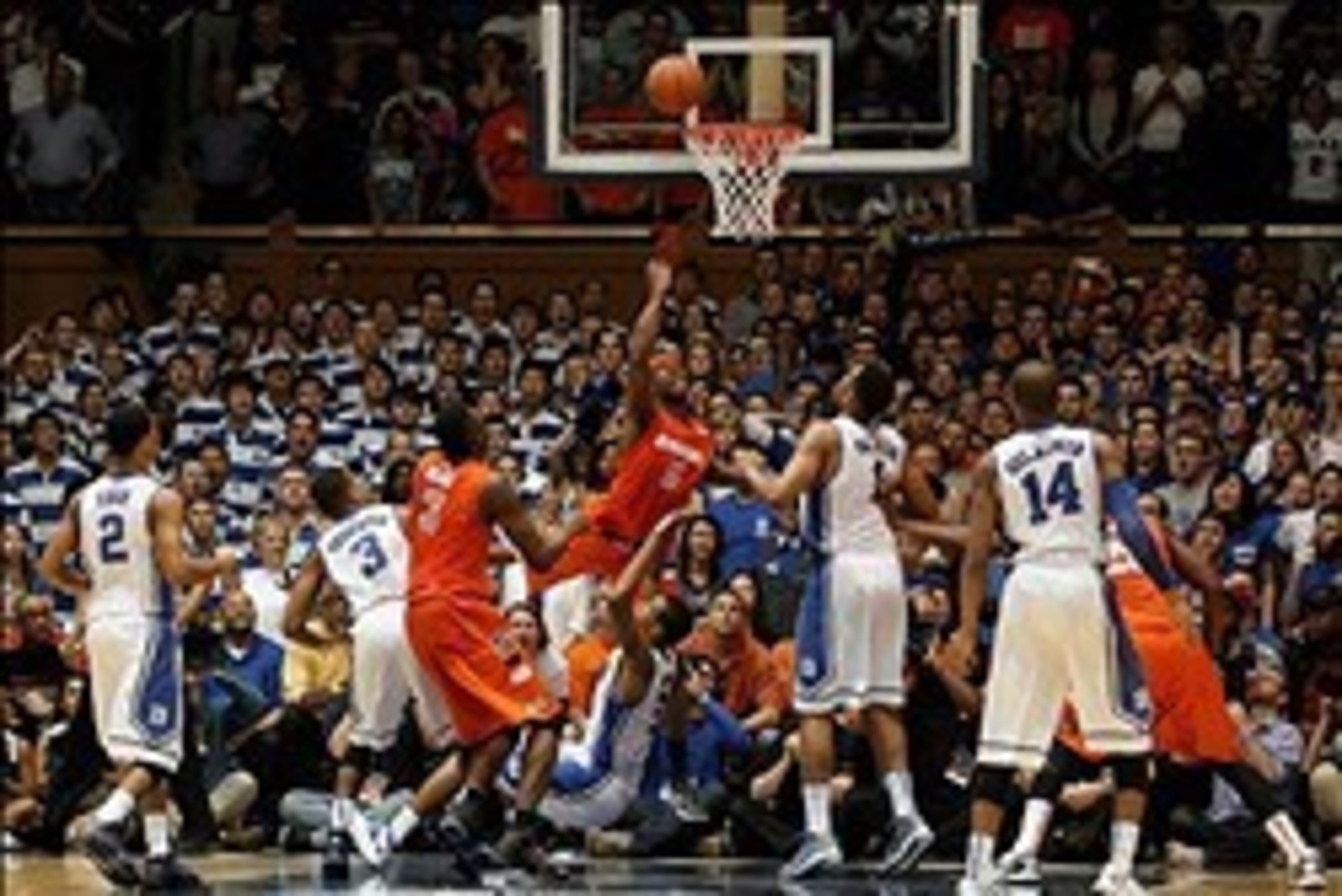 Feb 22, 2014; Durham, NC, USA; Syracuse Orange forward C.J. Fair (5) gets called for a charge as Duke Blue Devils forward Rodney Hood (5) defends near the end of their game at Cameron Indoor Stadium. Mandatory Credit: Mark Dolejs-USA TODAY Sports