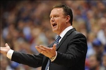 Feb 22, 2014; Lawrence, KS, USA; Kansas Jayhawks head coach Bill Self reacts to a call in the first half of the game against the Texas Longhorns at Allen Fieldhouse. Mandatory Credit: Denny Medley-USA TODAY Sports
