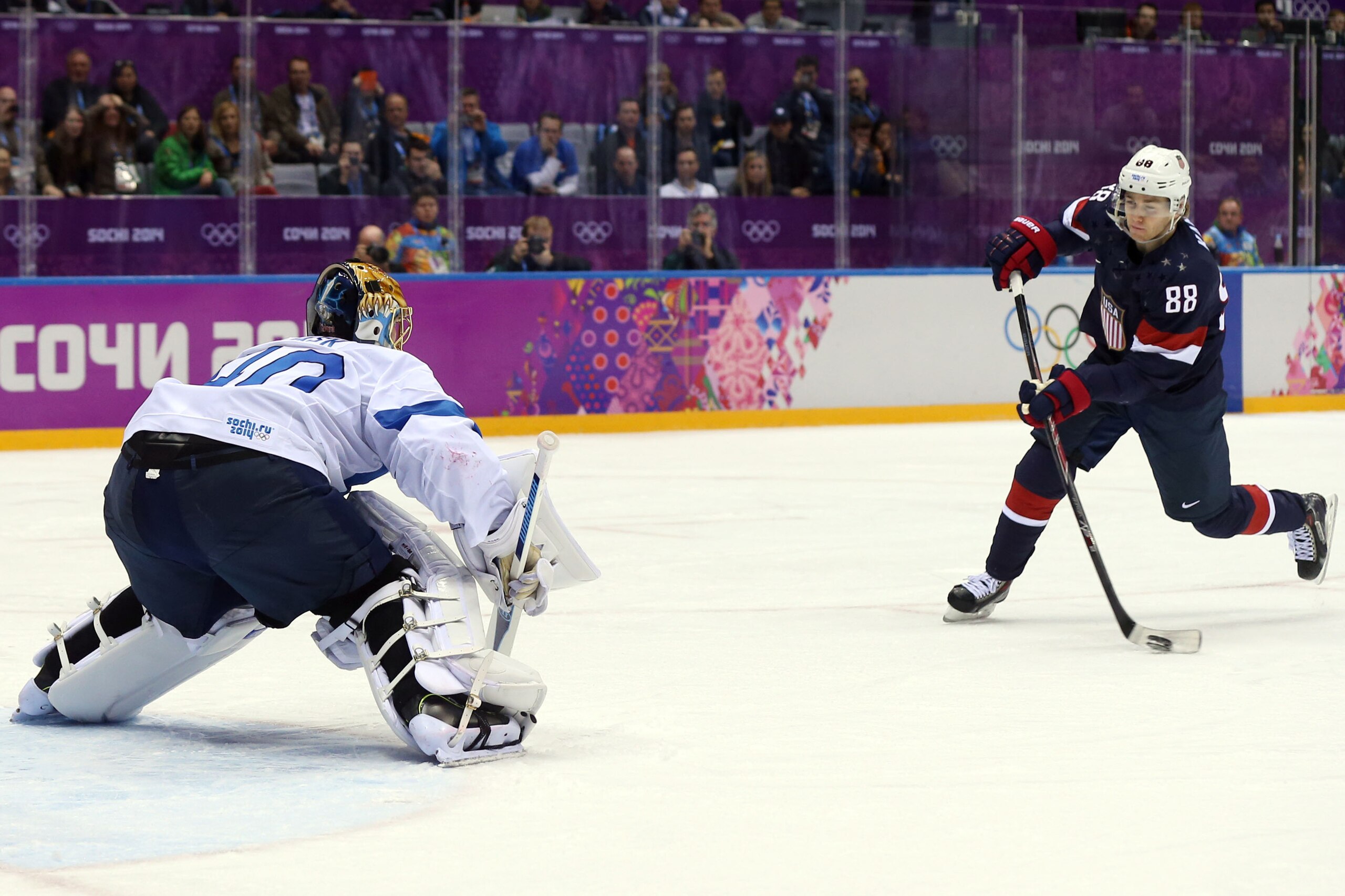 Feb 22, 2014; Sochi, RUSSIA; USA forward Patrick Kane (88) hits the post on a penalty shot attempt against Finland goalie Tuukka Rask (40) in the second period in the men's ice hockey bronze medal game during the Sochi 2014 Olympic Winter Games at Bolshoy