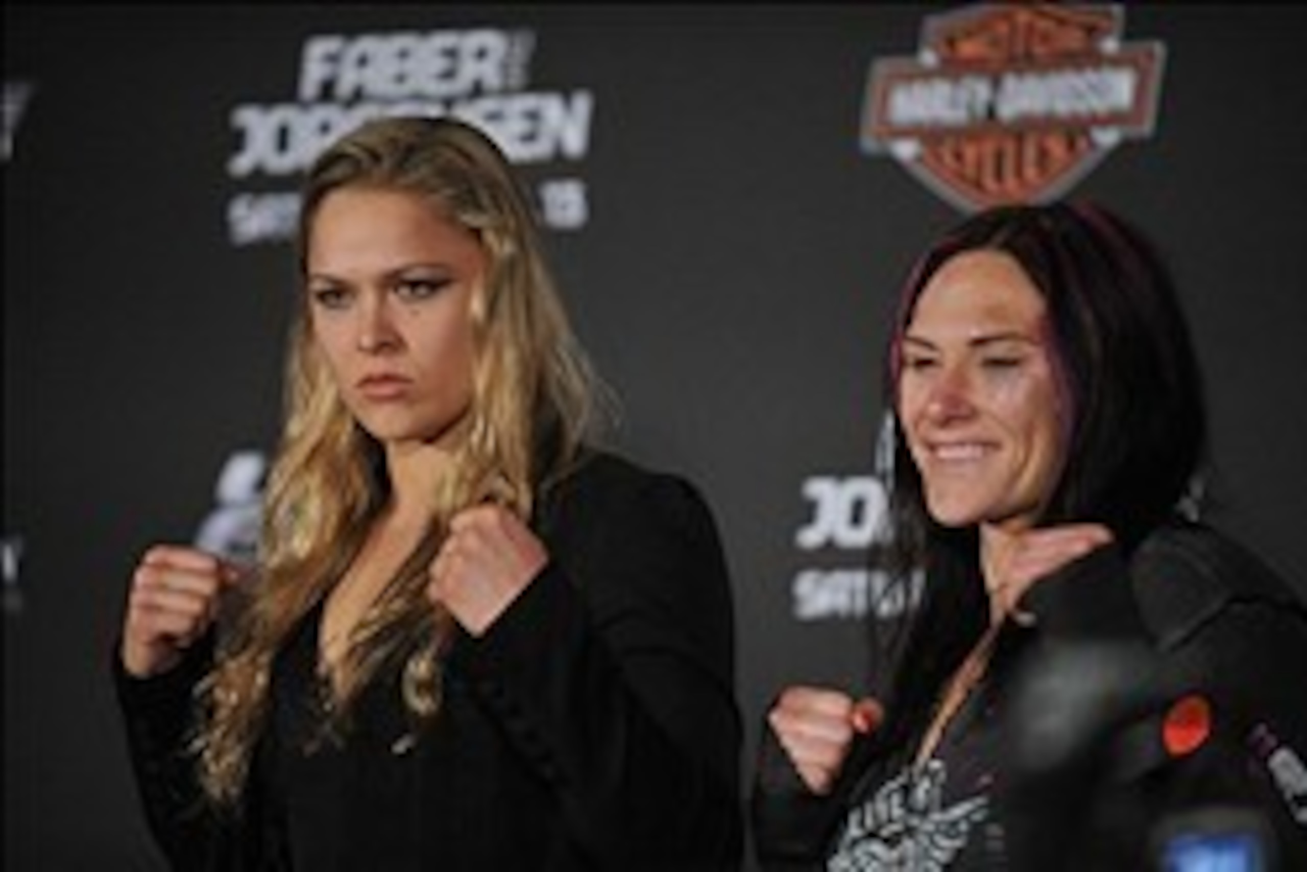April 13, 2013; Las Vegas, NV, USA; Ronda Rousey (left) poses for photographs with Cat Zingano following the TUF 17 Finale at the Mandalay Bay Events Center. Mandatory Credit: Gary A. Vasquez-USA TODAY Sports