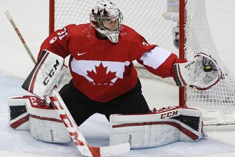 Canada defended its gold medals in men's and women's hockey.