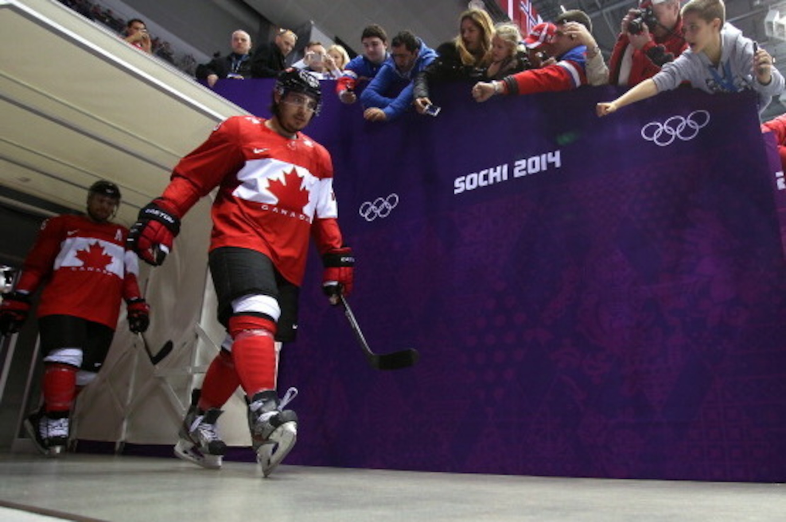 SOCHI, RUSSIA - FEBRUARY 21:  Drew Doughty #8 of Canada enters the arena during the Men's Ice Hockey Semifinal Playoff against the United States on Day 14 of the 2014 Sochi Winter Olympics at Bolshoy Ice Dome on February 21, 2014 in Sochi, Russia.  (Photo