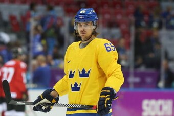 SOCHI, RUSSIA - FEBRUARY 23:  Erik Karlsson #65 of Sweden Warms up prior to the Men's Ice Hockey Gold Medal match against Canada on Day 16 of the 2014 Sochi Winter Olympics at Bolshoy Ice Dome on February 23, 2014 in Sochi, Russia.  (Photo by Bruce Bennet