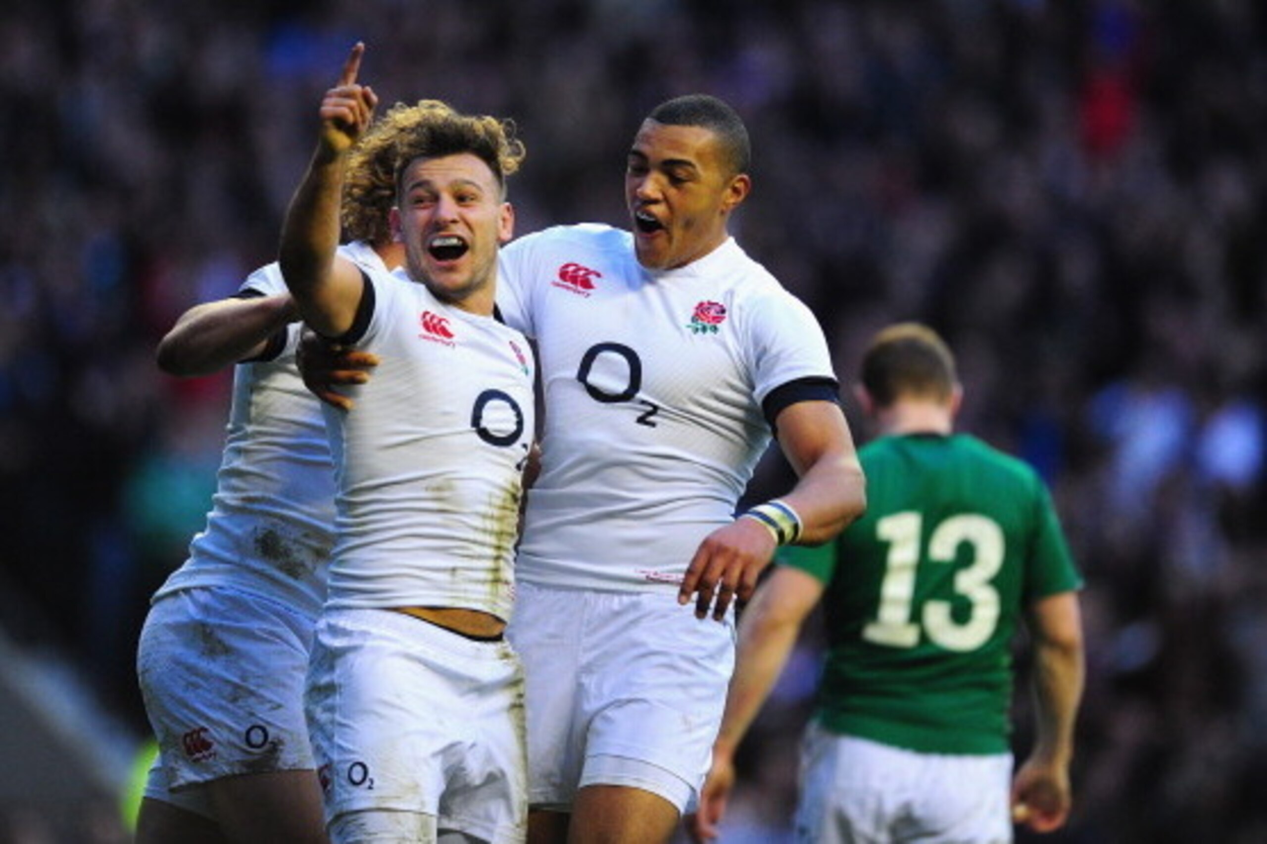 LONDON, ENGLAND - FEBRUARY 22:  England scrum half  Danny Care celebrates after scoring the first England try with Billy Twelvetrees (hidden) and Luther Burrell during the RBS Six Nations match between England and Ireland at Twickenham Stadium on February
