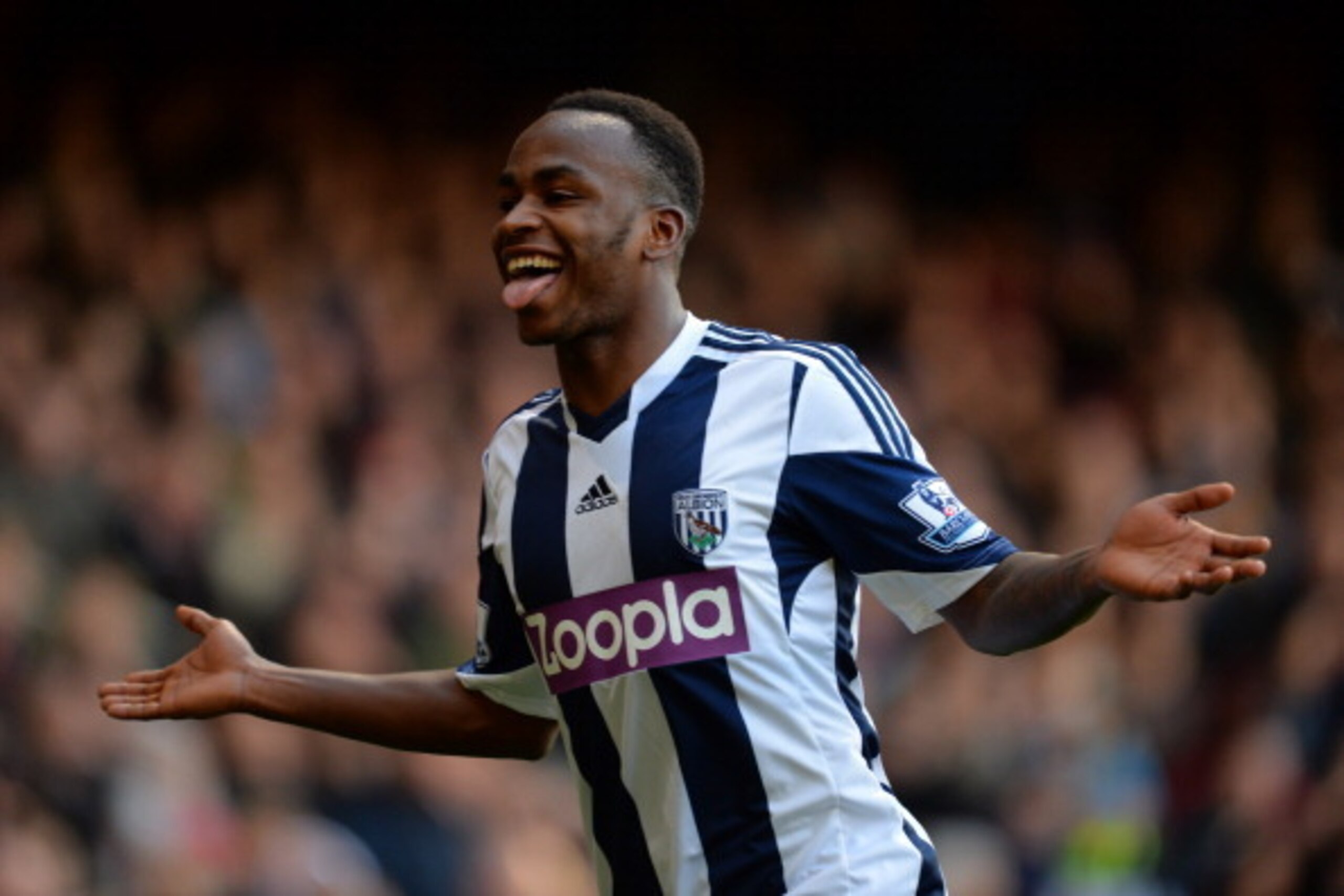 LONDON, ENGLAND - DECEMBER 28:  Saido Berahino of West Brom celebrates scoring their third goal during the Barclays Premier League match between West Ham United and West Bromwich Albion at Boleyn Ground on December 28, 2013 in London, England.  (Photo by 