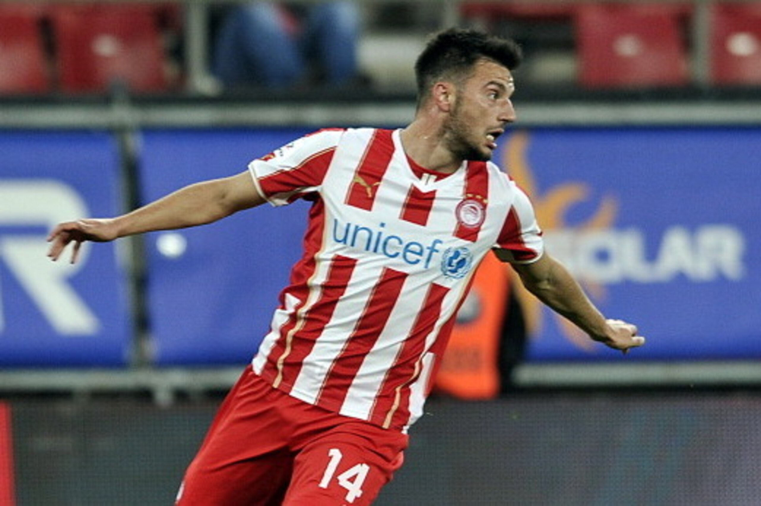 ATHENS,GREECE - FEBRUARY 5:  Andreas Samaris of Olympiacos F.C. in action during the Greek Superleague  match between Olympiacos F.C. and Panionios GSS at the Karaiskaki Stadium on February  5, 2014 in Piraeus near Athens. (Photo by Milos Bicanski/EuroFoo
