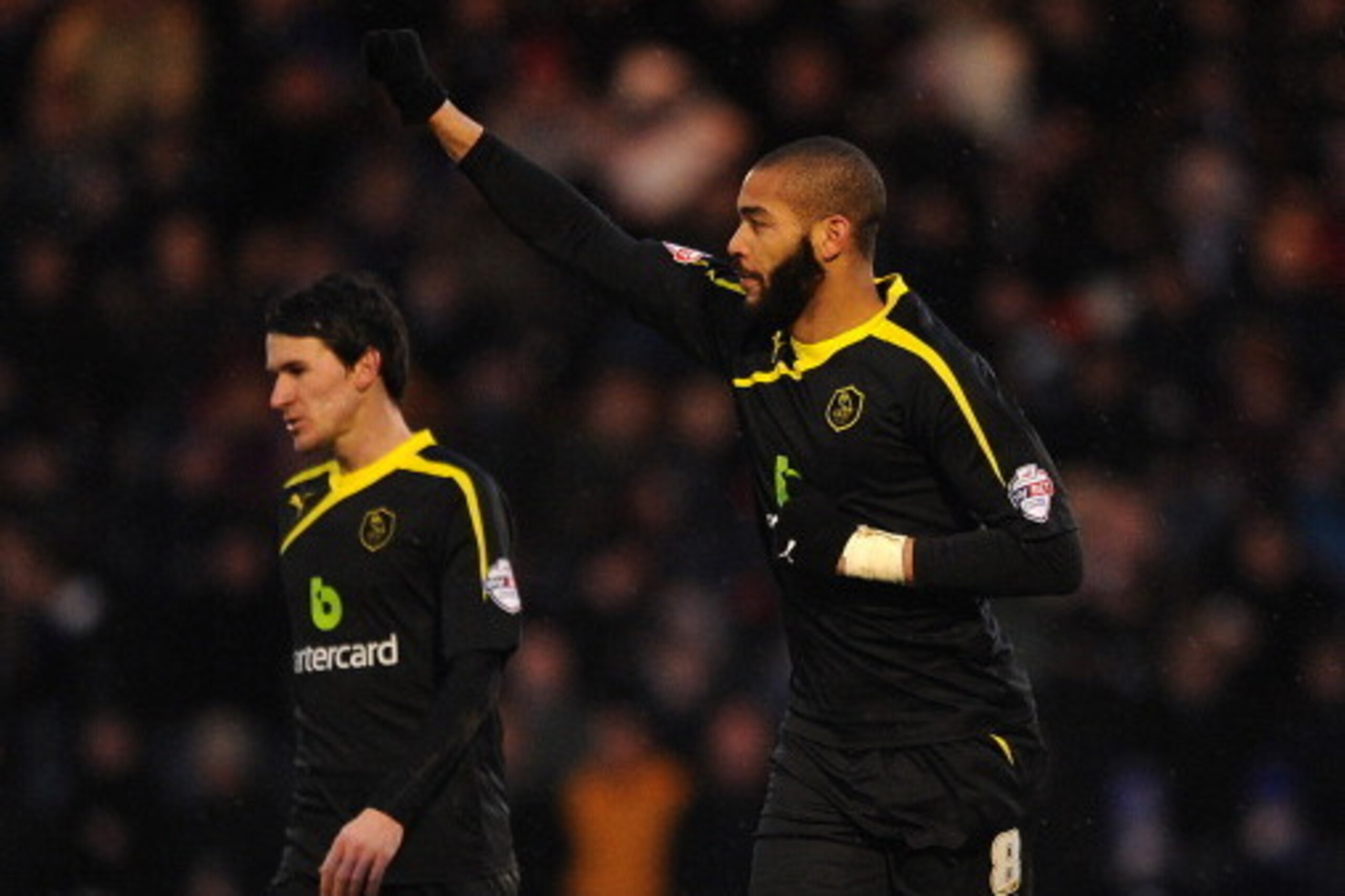 ROCHDALE, ENGLAND - JANUARY 25: Oguchi Onyewu of Sheffield Wednesday celebrates scoring his side's second goal during the FA Cup with Budweiser Fourth Round match between Rochdale and Sheffield Wednesday at Spotland on January 25, 2014 in Rochdale, Englan