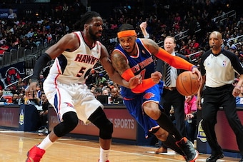 ATLANTA, GA - FEBRUARY 22:  Carmelo Anthony #7 of the New York Knicks handles the ball during a game against the Atlanta Hawks on February 22, 2014 at Philips Arena in Atlanta, Georgia.  NOTE TO USER: User expressly acknowledges and agrees that, by downlo