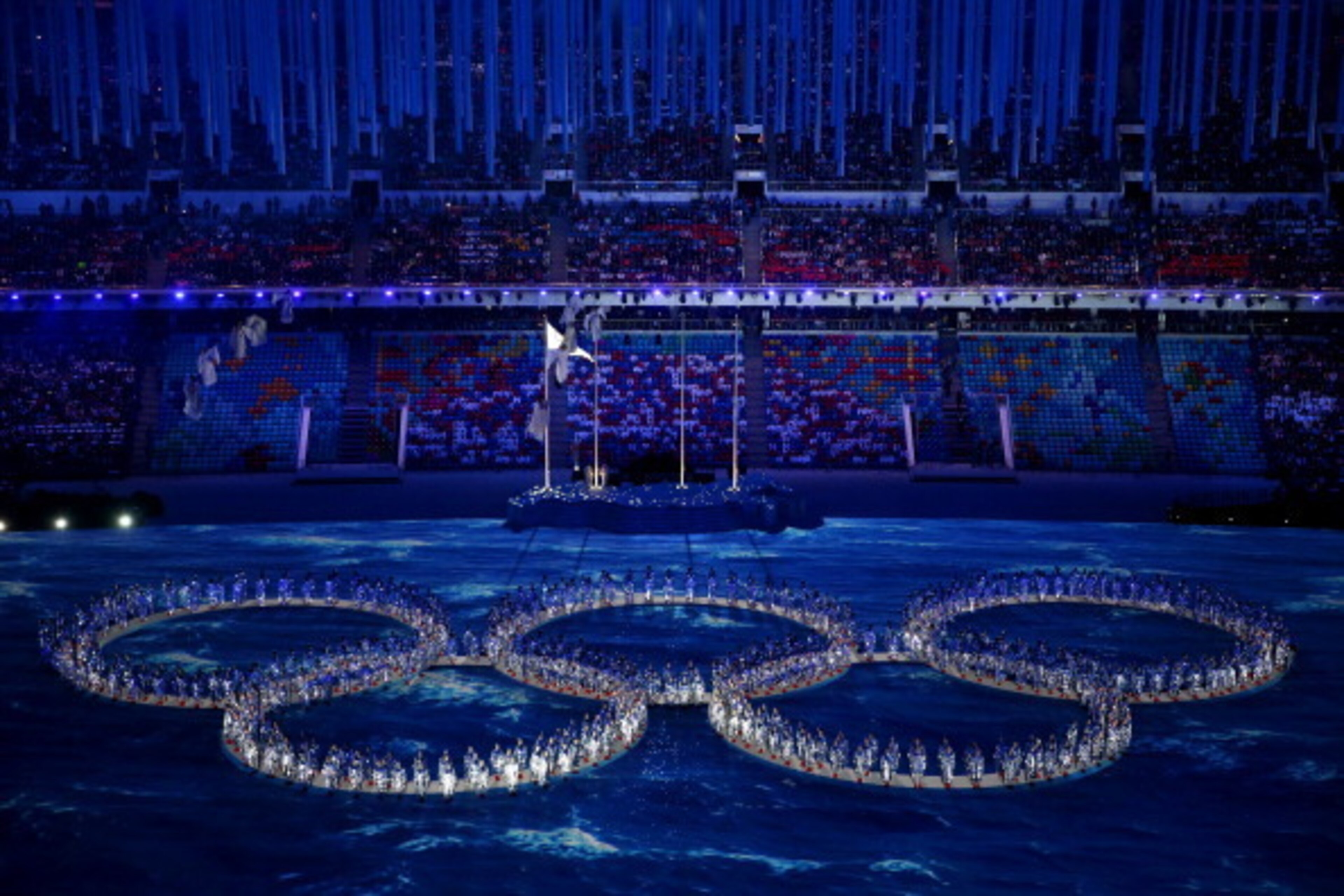 SOCHI, RUSSIA - FEBRUARY 23: Performers make the shape of the Olympic Rings during the 2014 Sochi Winter Olympics Closing Ceremony at Fisht Olympic Stadium on February 23, 2014 in Sochi, Russia. (Photo by Matthew Stockman/Getty Images) SOCHI, RUSSIA - FEBRUARY 23: Performers make the shape of the Olympic Rings during the 2014 Sochi Winter Olympics Closing Ceremony at Fisht Olympic Stadium on February 23, 2014 in Sochi, Russia. (Photo by Matthew Stockman/Getty Images)