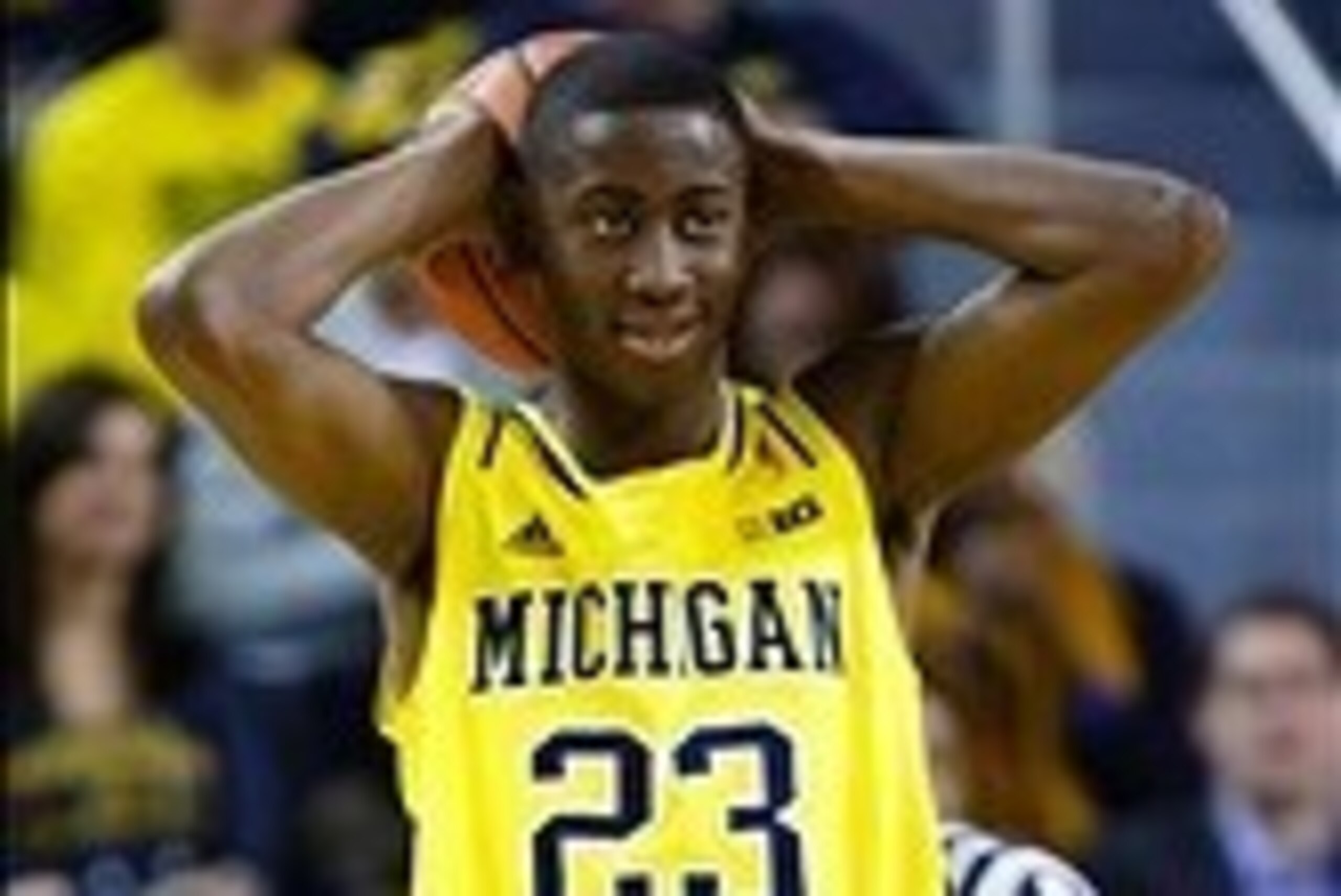 Feb 16, 2014; Ann Arbor, MI, USA; Michigan Wolverines guard Caris LeVert (23) reacts during the game against the Wisconsin Badgers at Crisler Arena. Mandatory Credit: Rick Osentoski-USA TODAY Sports Feb 16, 2014; Ann Arbor, MI, USA; Michigan Wolverines guard Caris LeVert (23) reacts during the game against the Wisconsin Badgers at Crisler Arena. Mandatory Credit: Rick Osentoski-USA TODAY Sports