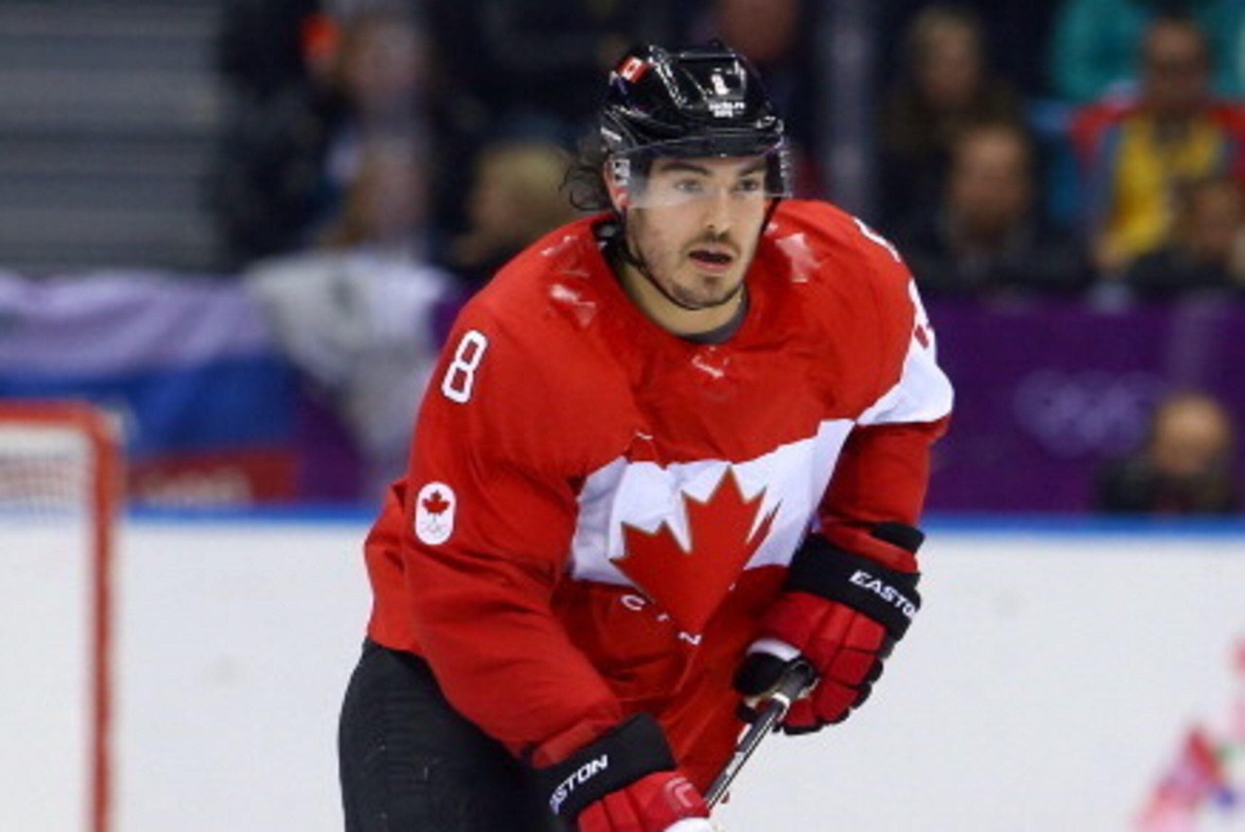 SOCHI, RUSSIA - FEBRUARY 21:  Drew Doughty #8 of Canada controls the puck during the Men's Ice Hockey Semifinal Playoff against the United States on Day 14 of the 2014 Sochi Winter Olympics at Bolshoy Ice Dome on February 21, 2014 in Sochi, Russia.  (Phot