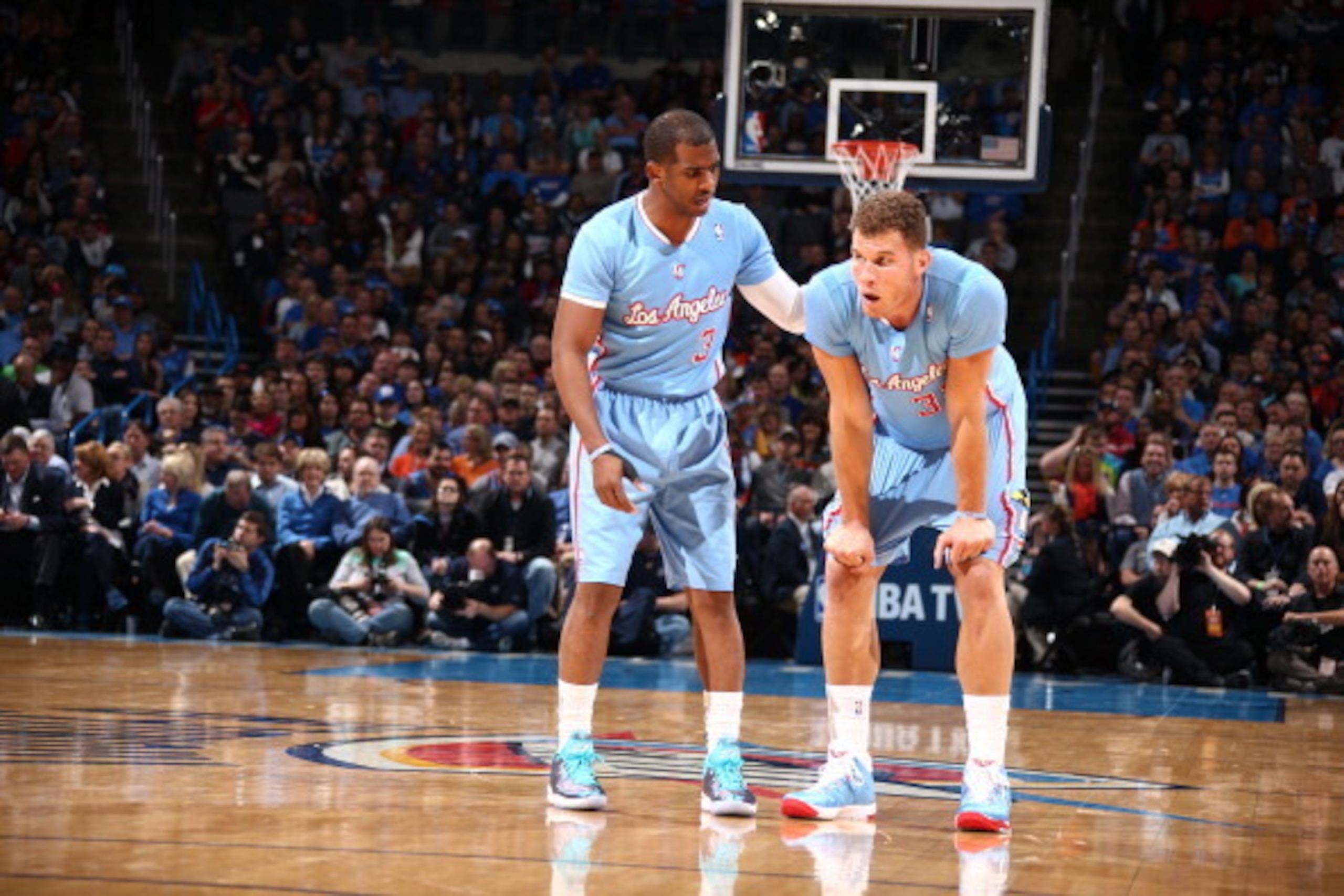 OKLAHOMA CITY, OK - FEBRUARY 23: Blake Griffin #32 of the Los Angeles Clippers and Chris Paul #3 of the Los Angeles Clippers react during a game at Chesapeake Energy Arena on February 23, 2014 in Oklahoma City, Oklahoma. NOTE TO USER: User expressly ackno