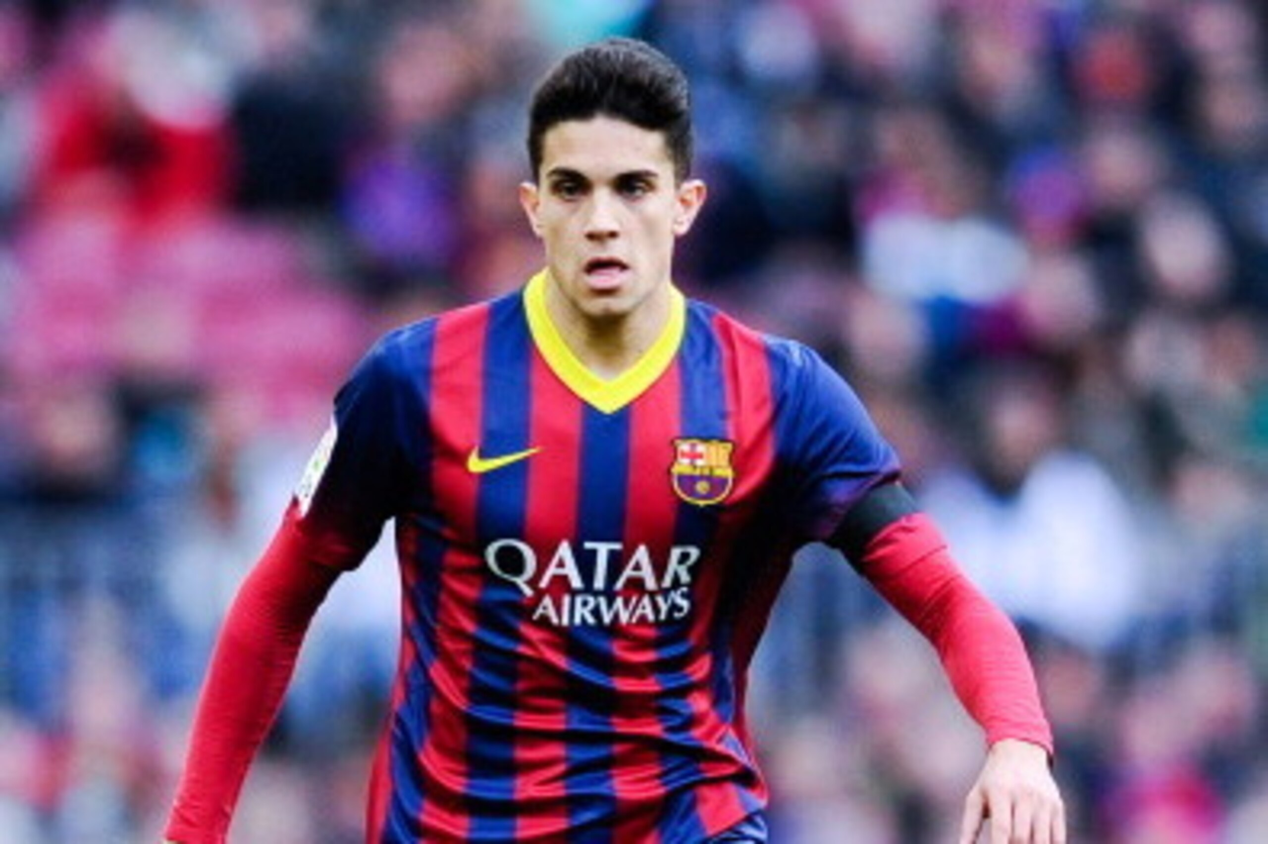 BARCELONA, SPAIN - JANUARY 05:  Marc Bartra of FC Barcelona runs with the ball during the La Liga match between FC Barcelona and Elche FC at Camp Nou on January 5, 2014 in Barcelona, Spain.  (Photo by David Ramos/Getty Images)