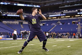 INDIANAPOLIS, IN - FEBRUARY 23: Former Alabama quarterback A.J. McCarron works out during the 2014 NFL Combine at Lucas Oil Stadium on February 23, 2014 in Indianapolis, Indiana. (Photo by Joe Robbins/Getty Images)
