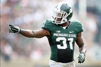 Sep 7, 2013; East Lansing, MI, USA; Michigan State Spartans cornerback Darqueze Dennard (31) points to South Florida Bulls offense during the 2nd half at Spartan Stadium. MSU won 21-6. Mandatory Credit: Mike Carter-USA TODAY Sports