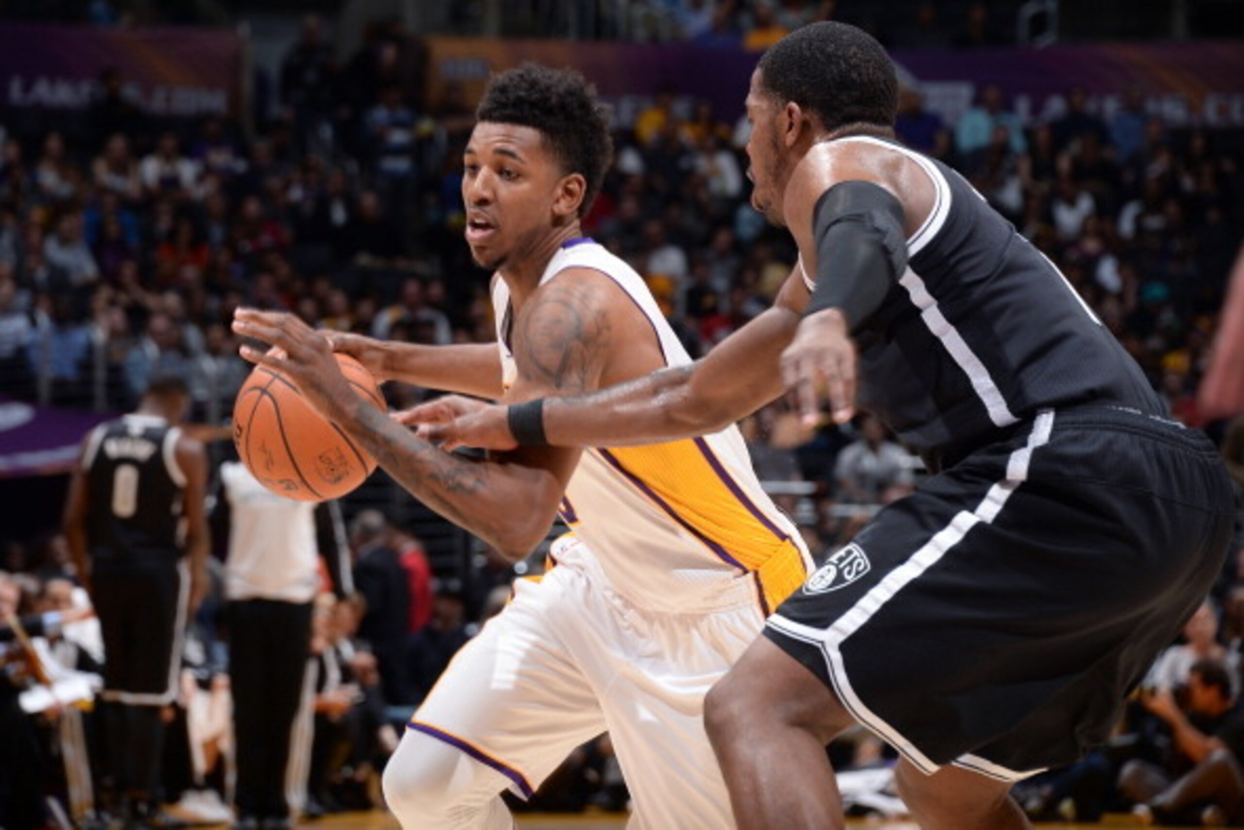 LOS ANGELES, CA - FEBRUARY 23: Nick Young #0 of the Los Angeles Lakers drives against the Brooklyn Nets at STAPLES Center on February 23, 2014 in Los Angeles, California. NOTE TO USER: User expressly acknowledges and agrees that, by downloading and/or usi