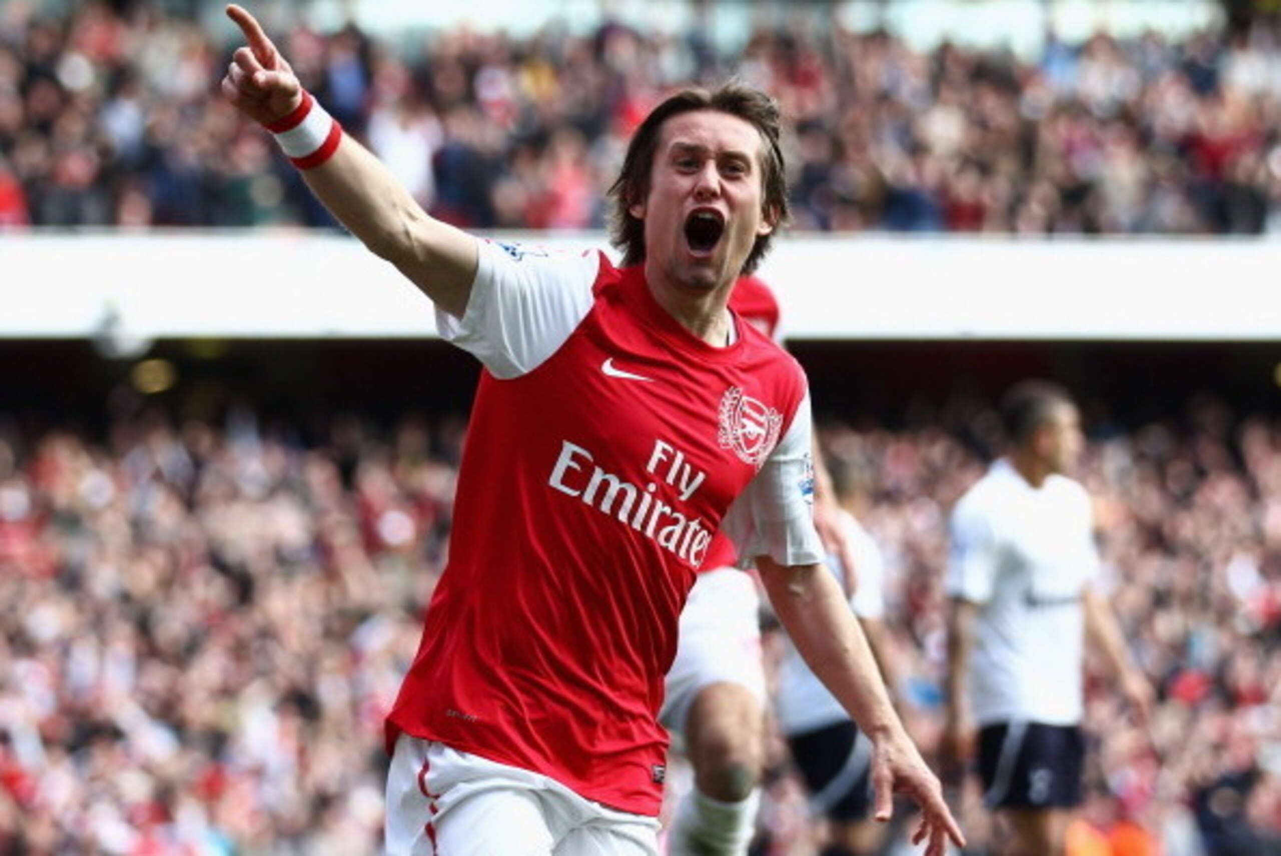 LONDON, ENGLAND - FEBRUARY 26:  Tomas Rosicky of Arsenal celebrates his goal during the Barclays Premier League match between Arsenal and Tottenham Hotspur at Emirates Stadium on February 26, 2012 in London, England.  (Photo by Clive Mason/Getty Images)