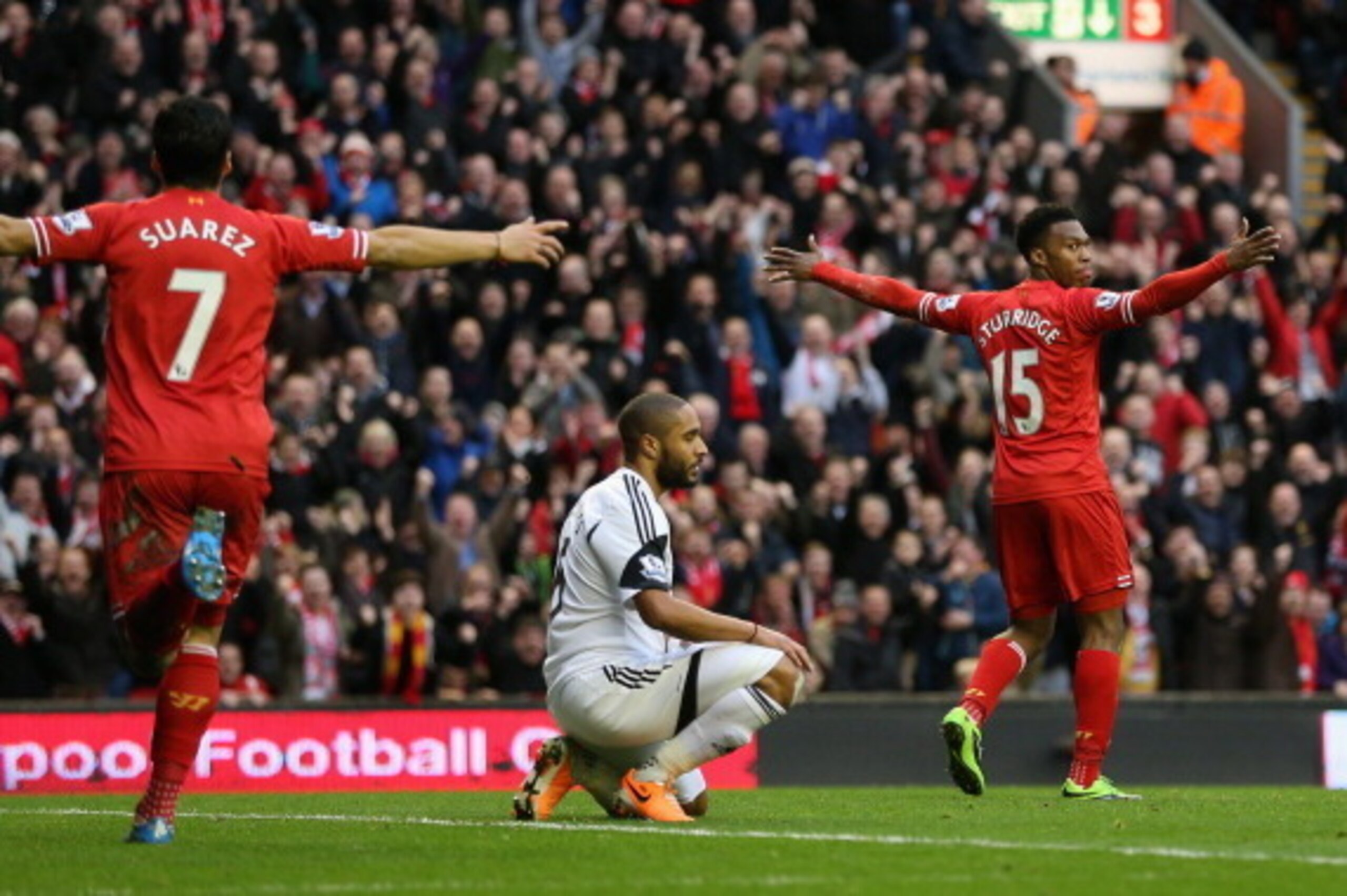 LIVERPOOL, ENGLAND - FEBRUARY 23:  Daniel Sturridge of Liverpool celebrates scoring his team's third goal  during the Barclays Premier League match between Liverpool and Swansea City at Anfield on February 23, 2014 in Liverpool, England.  (Photo by Clive 