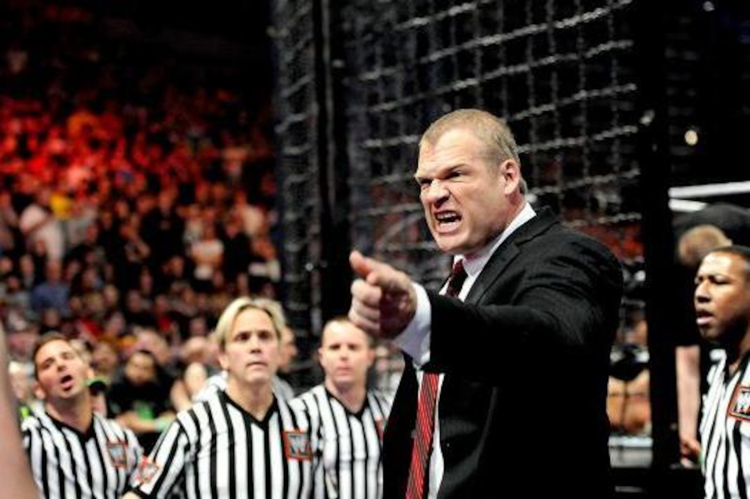 Kane scolds The Wyatt Family outside the Elimination Chamber.