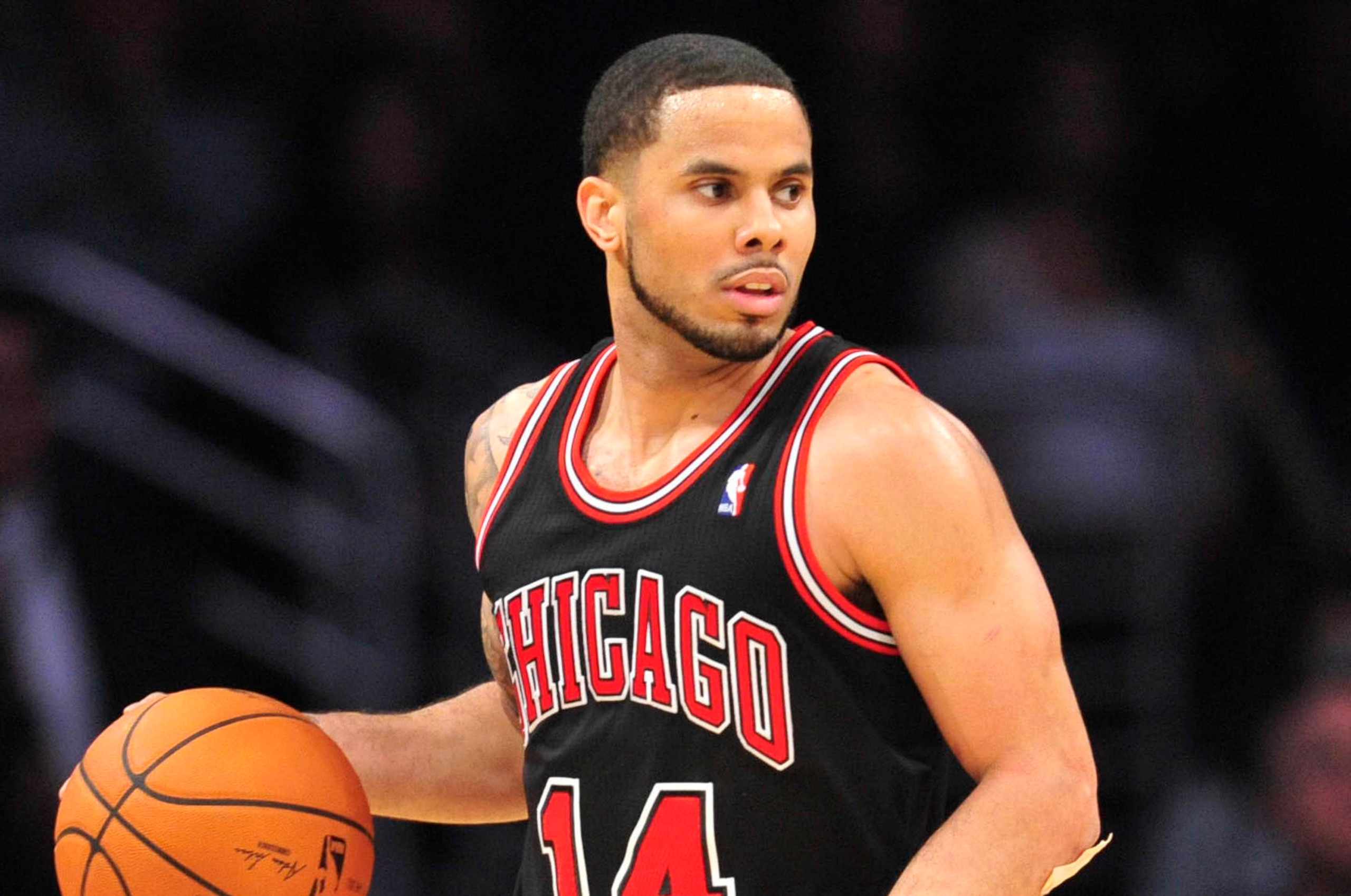 February 9, 2014; Los Angeles, CA, USA; Chicago Bulls point guard D.J. Augustin (14) controls the ball against the Los Angeles Lakers during the second half at Staples Center. Mandatory Credit: Gary A. Vasquez-USA TODAY Sports
