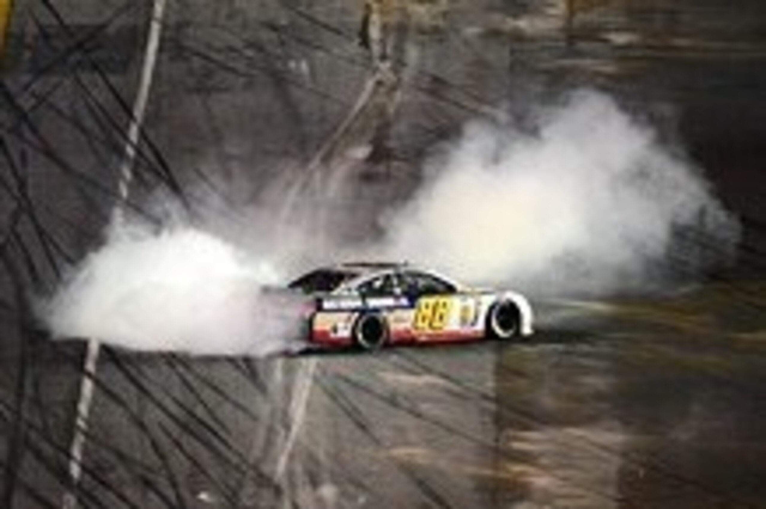Feb 23, 2014; Daytona Beach, FL, USA; NASCAR Sprint Cup driver Dale Earnhardt Jr (88) celebrates winning the Daytona 500 at Daytona International Speedway. Mandatory Credit: Andrew Weber-USA TODAY Sports