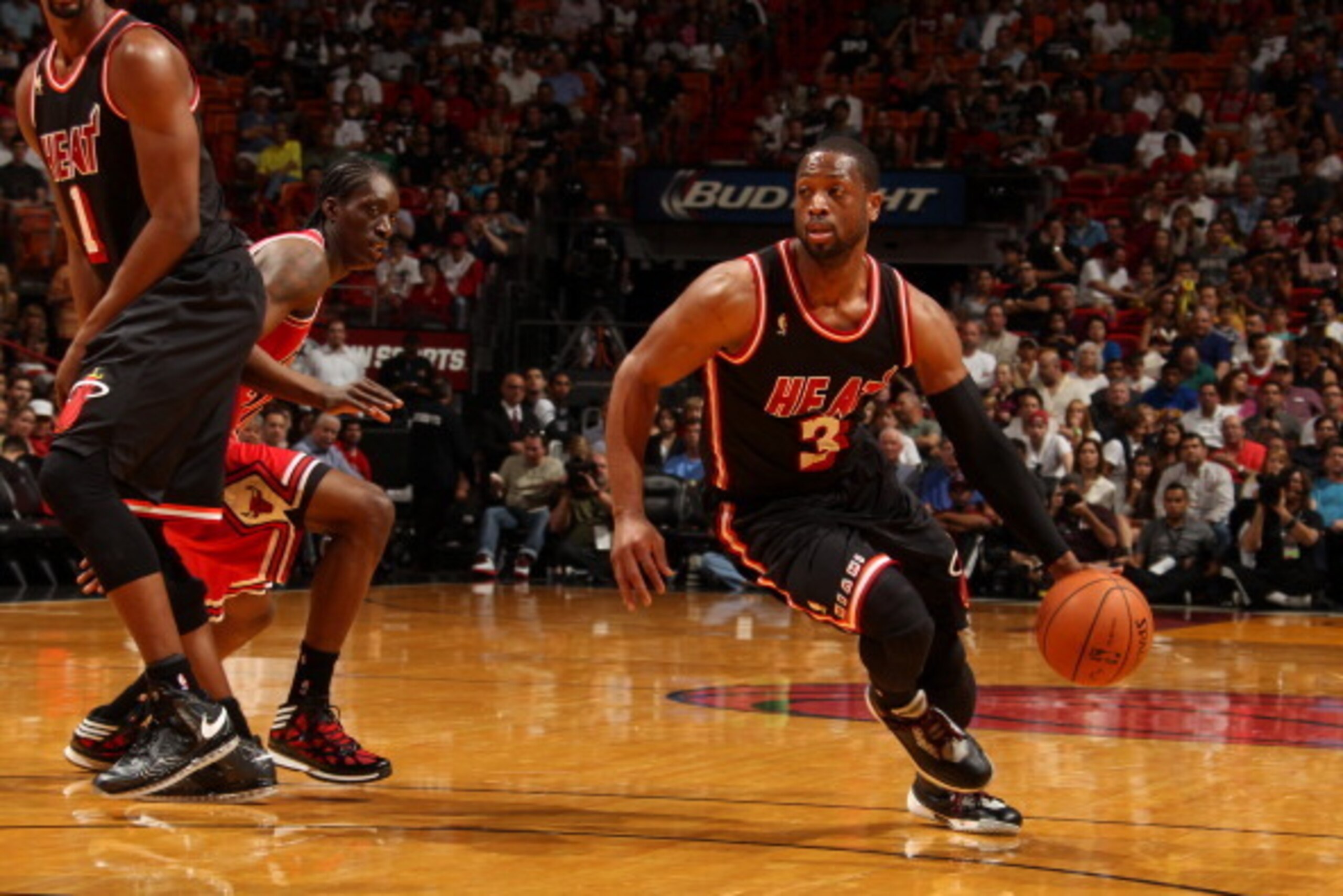 MIAMI, FL - February 23: Dwyane Wade #3 of the Miami Heat dribbles up the court against the Chicago Bulls at the American Airlines Arena in Miami, Florida on Feb. 3, 2014. NOTE TO USER: User expressly acknowledges and agrees that, by downloading and/or us
