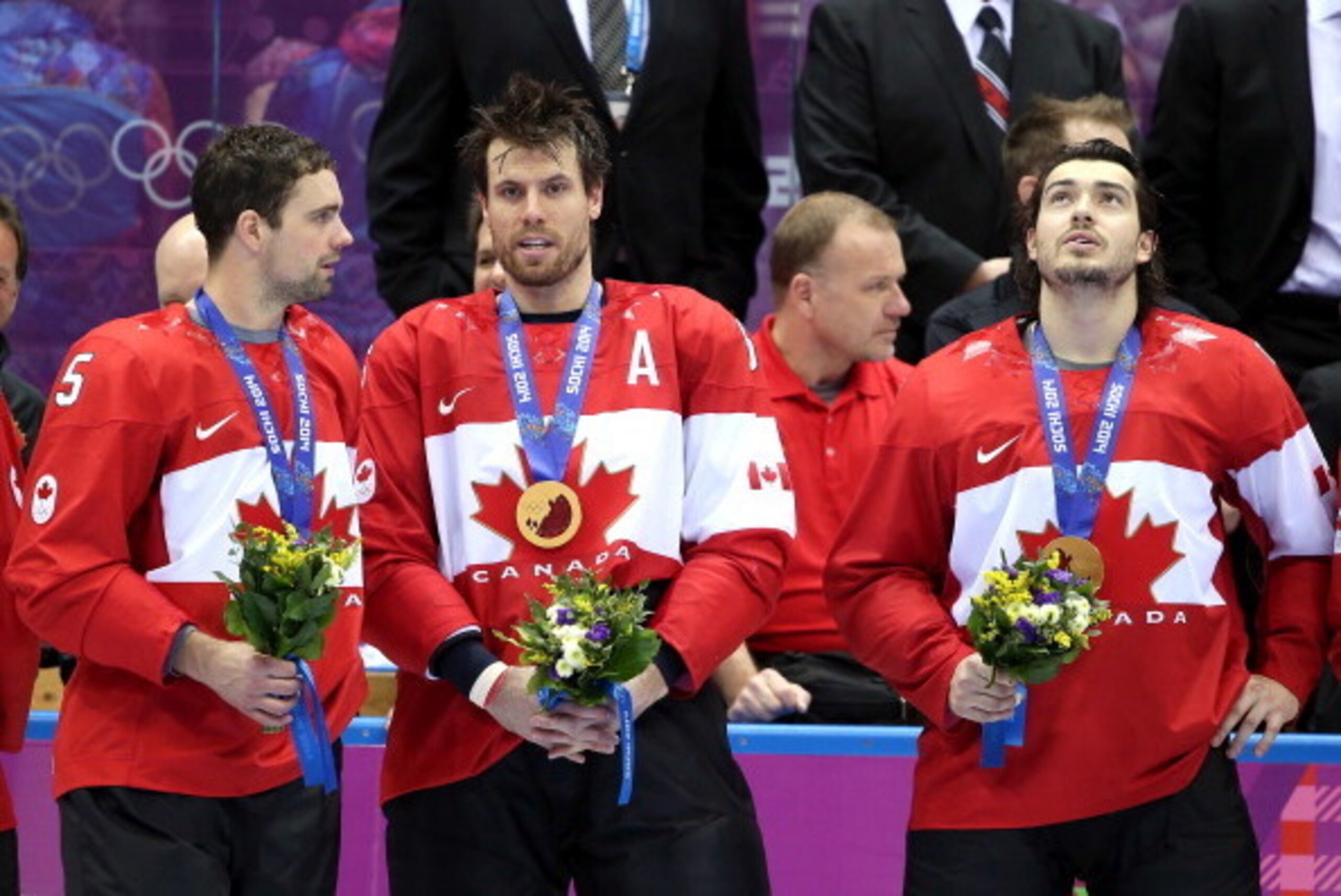 SOCHI, RUSSIA - FEBRUARY 23:  Gold medalists Dan Hamhuis #5, Shea Weber #6 and Drew Doughty #8 of Canada celebrate during the medal ceremony after defeating Sweden 3-0 during the Men's Ice Hockey Gold Medal match on Day 16 of the 2014 Sochi Winter Olympic