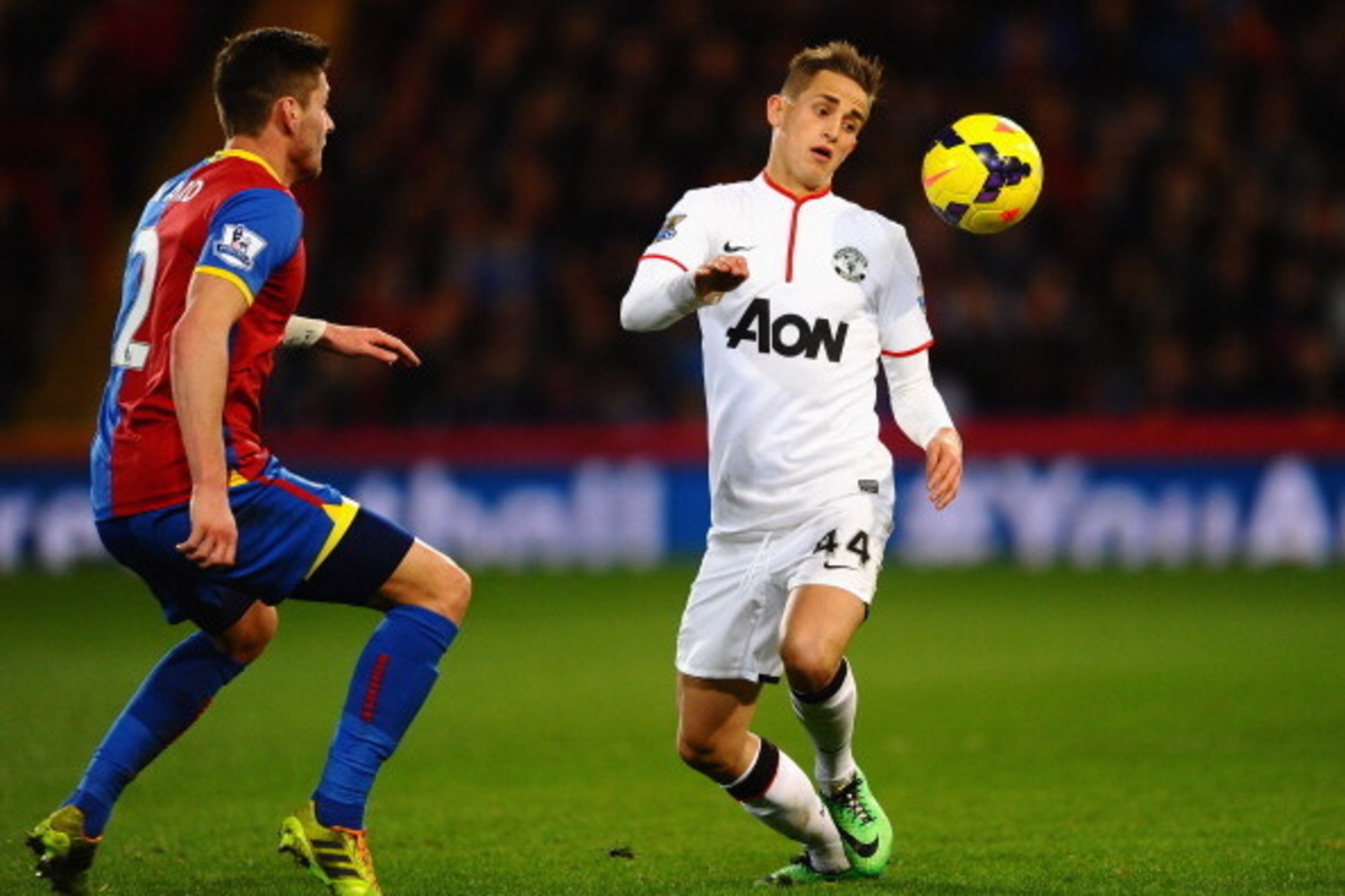 LONDON, ENGLAND - FEBRUARY 22:  Adnan Januzaj of Manchester United battles with Joel Ward of Crystal Palace during the Barclays Premier League match between Crystal Palace and Manchester United at Selhurst Park on February 22, 2014 in London, England.  (P