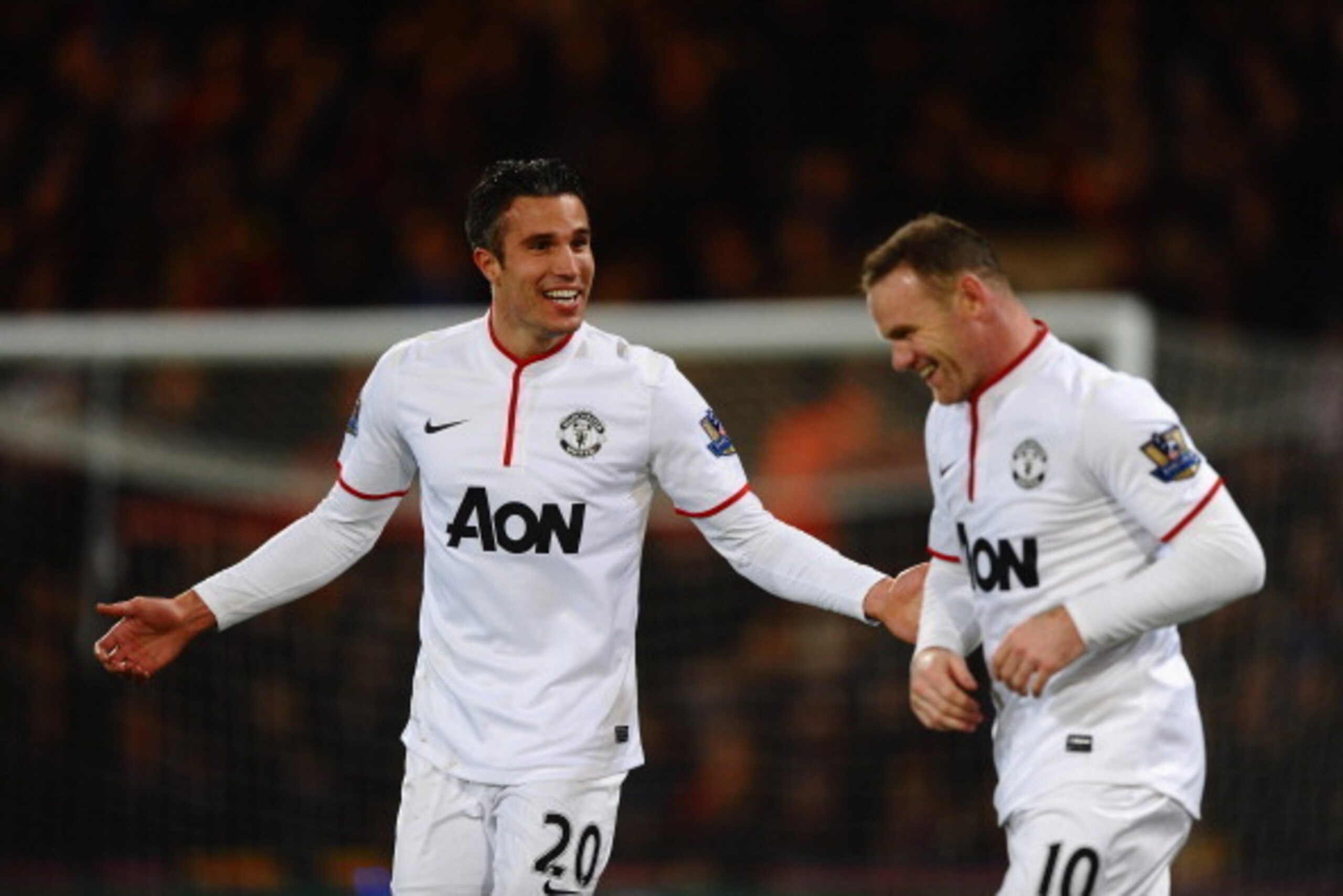 LONDON, ENGLAND - FEBRUARY 22:  Robin Van Persie of Manchester United celebrates the first goal with Wayne Rooney during the Barclays Premier League match between Crystal Palace and Manchester United at Selhurst Park on February 22, 2014 in London, Englan