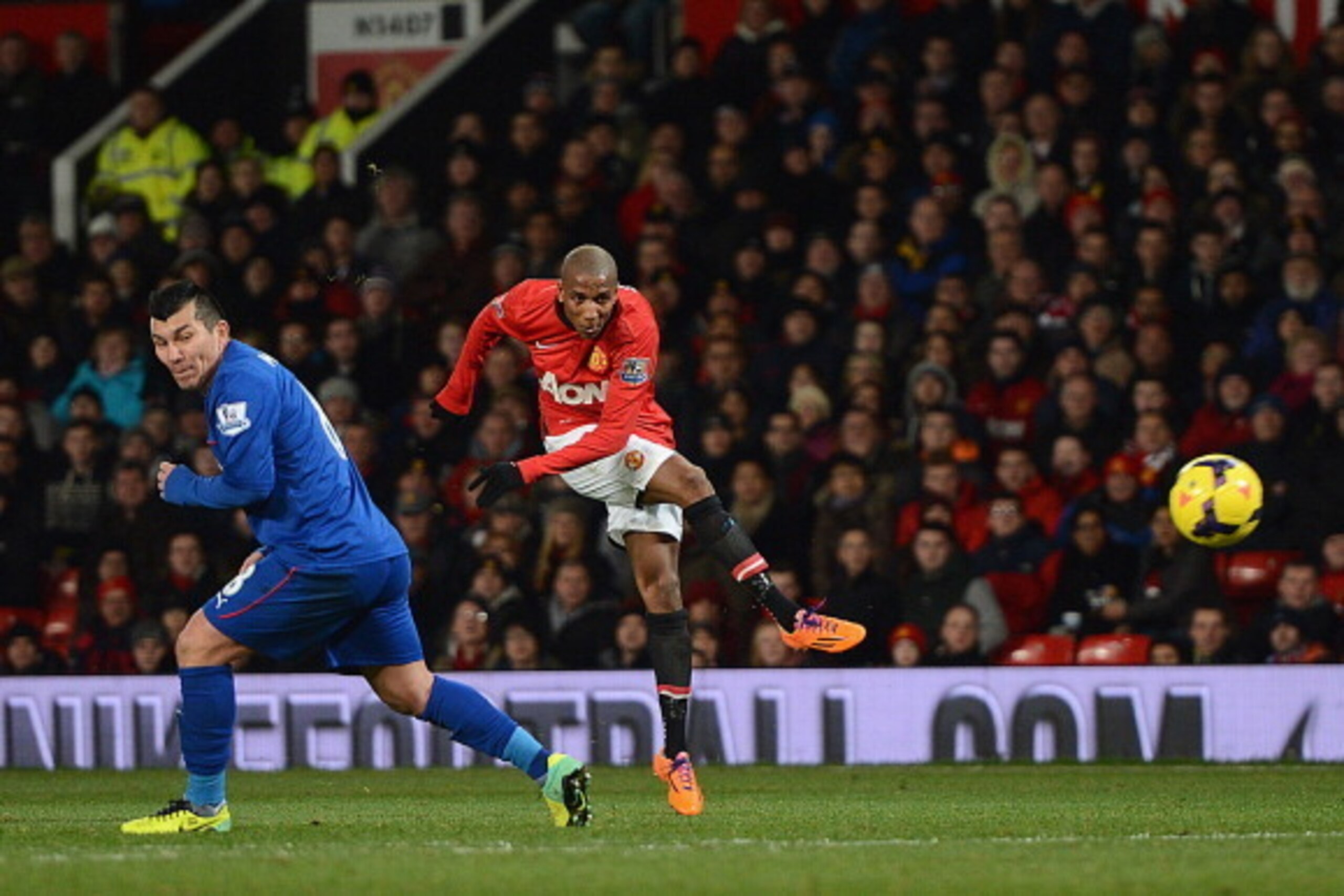 MANCHESTER, ENGLAND - JANUARY 28:   Ashley Young of Manchester United scores his team's second goal during the Barclays Premier League match between Manchester United and Cardiff City at Old Trafford on January 28, 2014 in Manchester, England.  (Photo by 