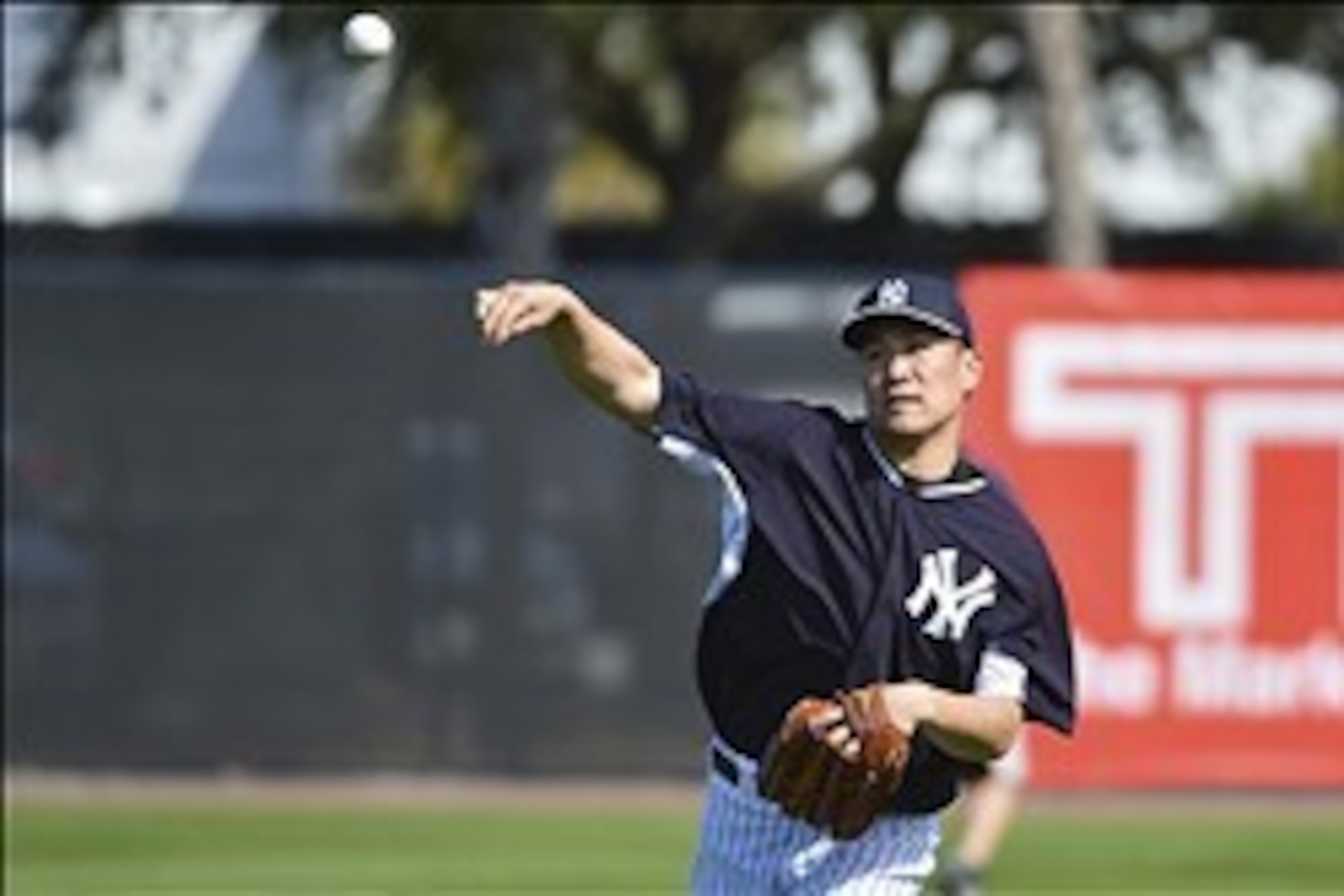 Feb 19, 2014; Tampa, FL, USA; New York Yankees pitcher Masahiro Tanaka (19) throws during spring morning practice at George M. Steinbrenner Field. Mandatory Credit: Tommy Gilligan-USA TODAY Sports