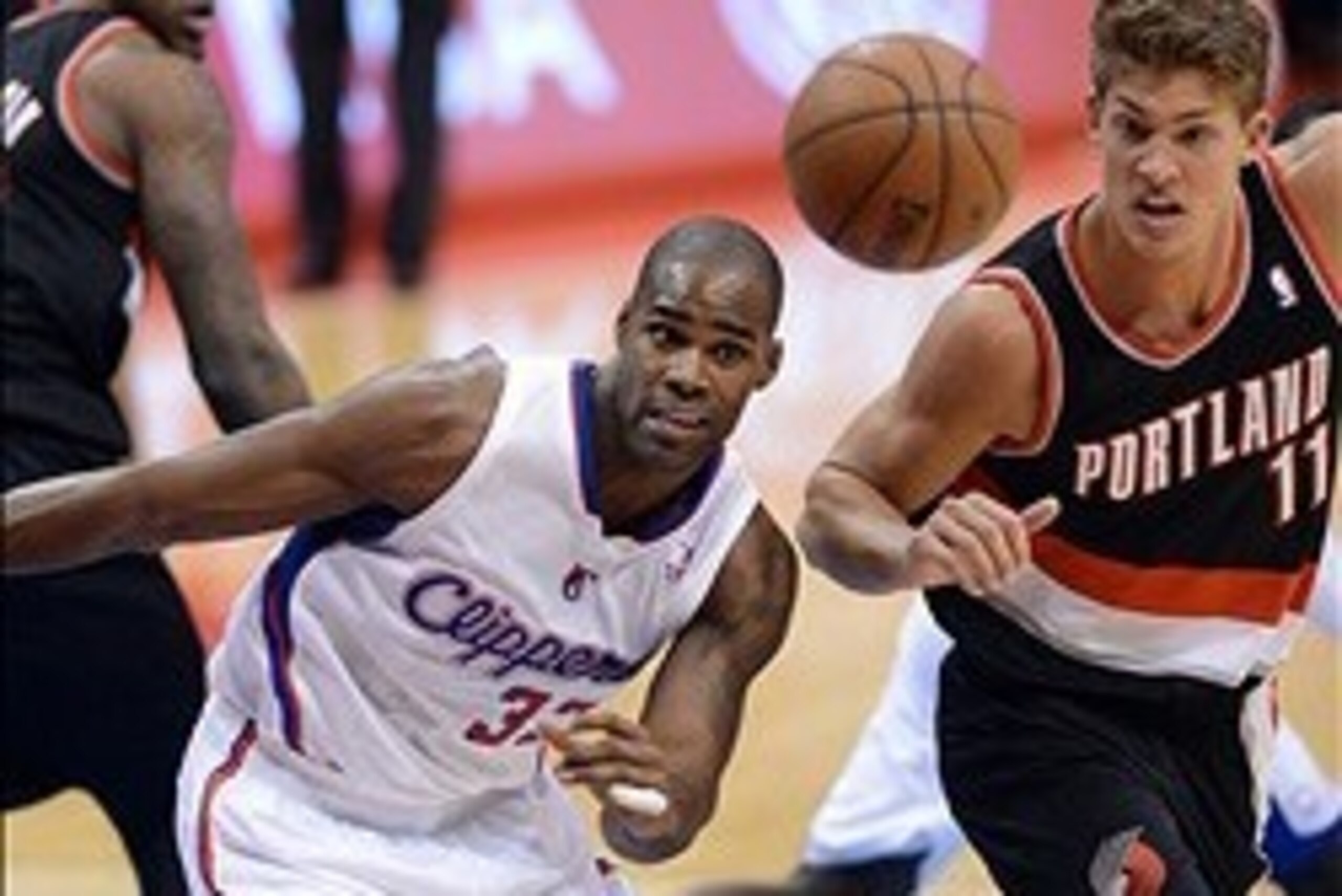 Oct 18, 2013; Los Angeles, CA, USA; Los Angeles Clippers power forward Antawn Jamison (33) and Portland Trail Blazers center Meyers Leonard (11) go for a rebound in the second half of the game at the Staples Center. Mandatory Credit: Jayne Kamin-Oncea-USA