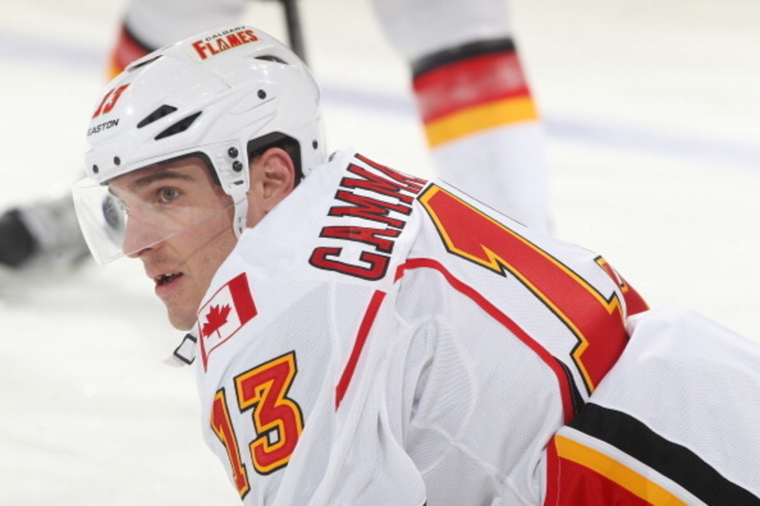 DENVER, CO - JANUARY 06: Mike Cammalleri #13 of the Calgary Flames stretches prior to the game against the Colorado Avalanche at the Pepsi Center on January 06, 2014 in Denver, Colorado. (Photo by Michael Martin/NHLI via Getty Images) DENVER, CO - JANUARY 06: Mike Cammalleri #13 of the Calgary Flames stretches prior to the game against the Colorado Avalanche at the Pepsi Center on January 06, 2014 in Denver, Colorado. (Photo by Michael Martin/NHLI via Getty Images)