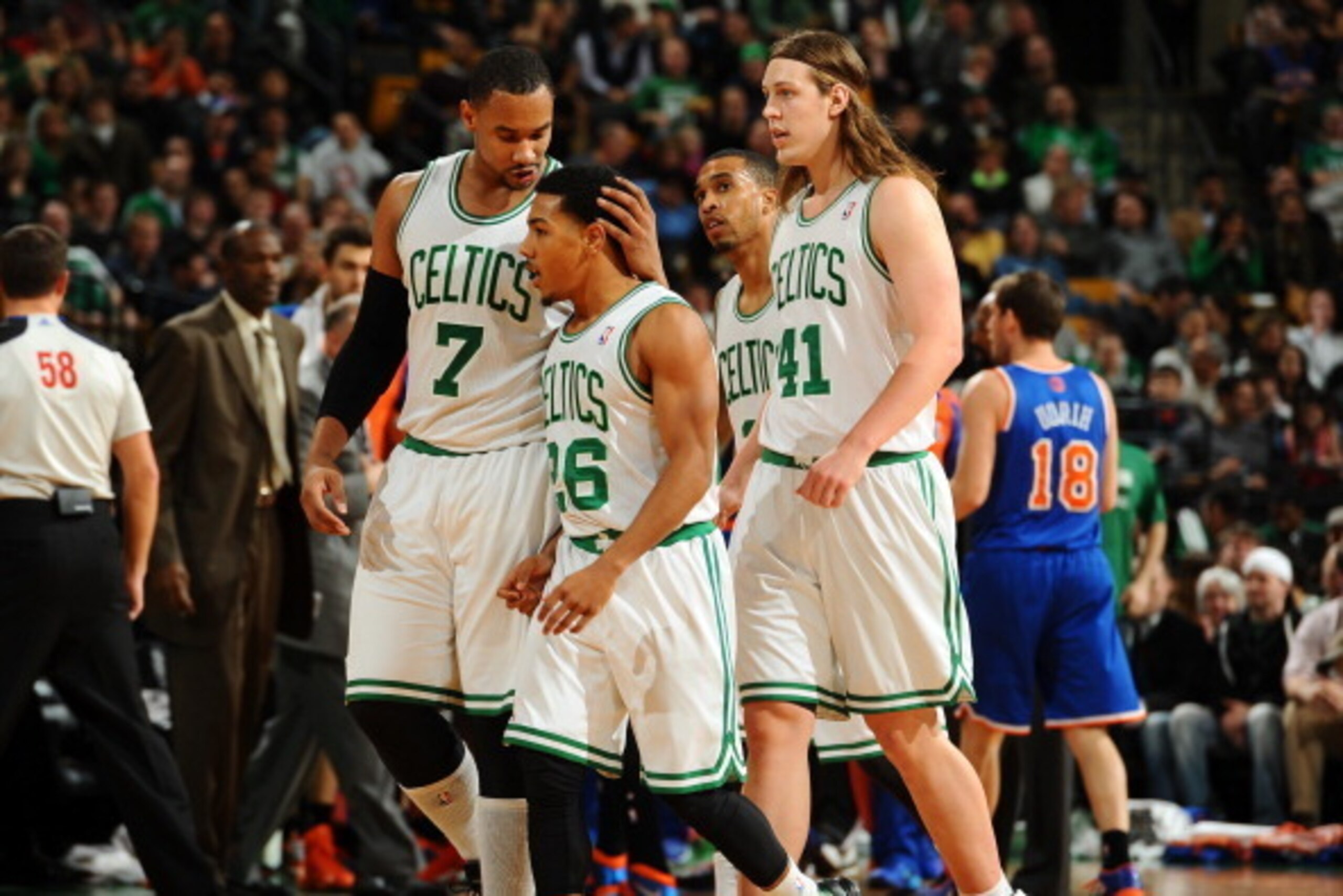 BOSTON, MA - DECEMBER 13: Jared Sullinger #7, Phil Pressey #26 and Kelly Olynyk #41 of the Boston Celtics walk back to the bench after a play against the New York Knicks on December 13, 2013 at the TD Garden in Boston, Massachusetts.  NOTE TO USER: User e