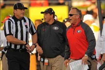 Nov 16, 2013; Auburn, AL, USA; Georgia Bulldogs head coach Mark Richt protests a call in the first half against the Auburn Tigers at Jordan Hare Stadium. Mandatory Credit: Shanna Lockwood-USA TODAY Sports