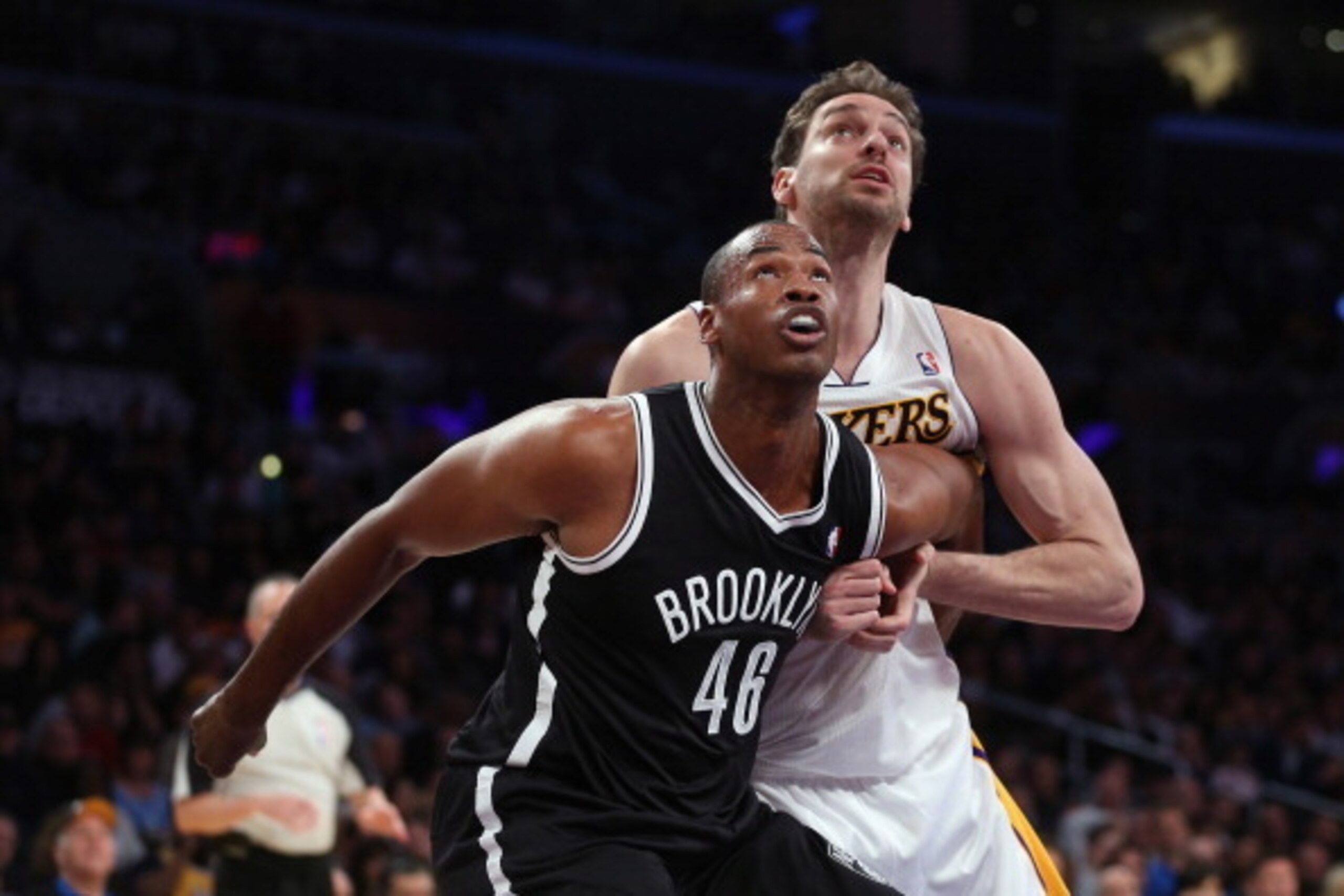 LOS ANGELES, CA - FEBRUARY 23:  Jason Collins #46 of the Brooklyn Nets and Pau Gasol #16 of the Los Angeles Lakers battle for position under the net in the second half at Staples Center on February 23, 2014 in Los Angeles, California. The Nets defeated th