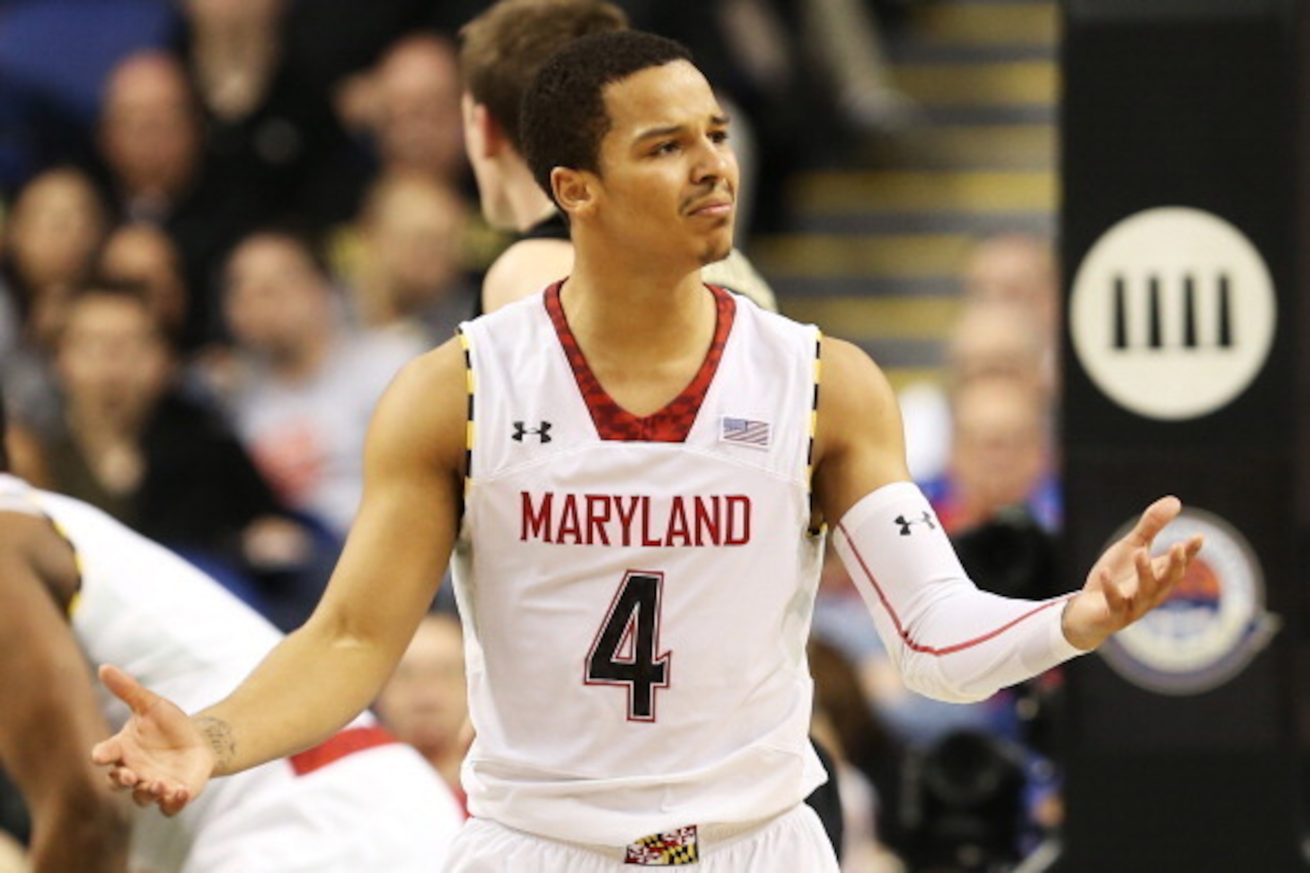 GREENSBORO, NC - MARCH 14:  Seth Allen #4 of the Maryland Terrapins reacts in the second half against the Wake Forest Demon Deacons during the first round of the Men's ACC Basketball Tournament at Greensboro Coliseum on March 14, 2013 in Greensboro, North