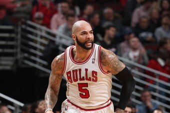 CHICAGO, IL - JANUARY 24: Carlos Boozer #5 of the Chicago Bulls runs down courts during the game against the Los Angeles Clippers on January 24, 2014 at the United Center in Chicago, Illinois. NOTE TO USER: User expressly acknowledges and agrees that, by