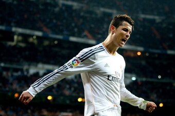 MADRID, SPAIN - FEBRUARY 05: Cristiano Ronaldo of Real Madrid CF reacts as he fails to score during the Copa del Rey semifinal first leg match between Real Madrid CF and Club Atletico Madrid at Estadio Santiago Bernabeu on February 5, 2014 in Madrid, Spai