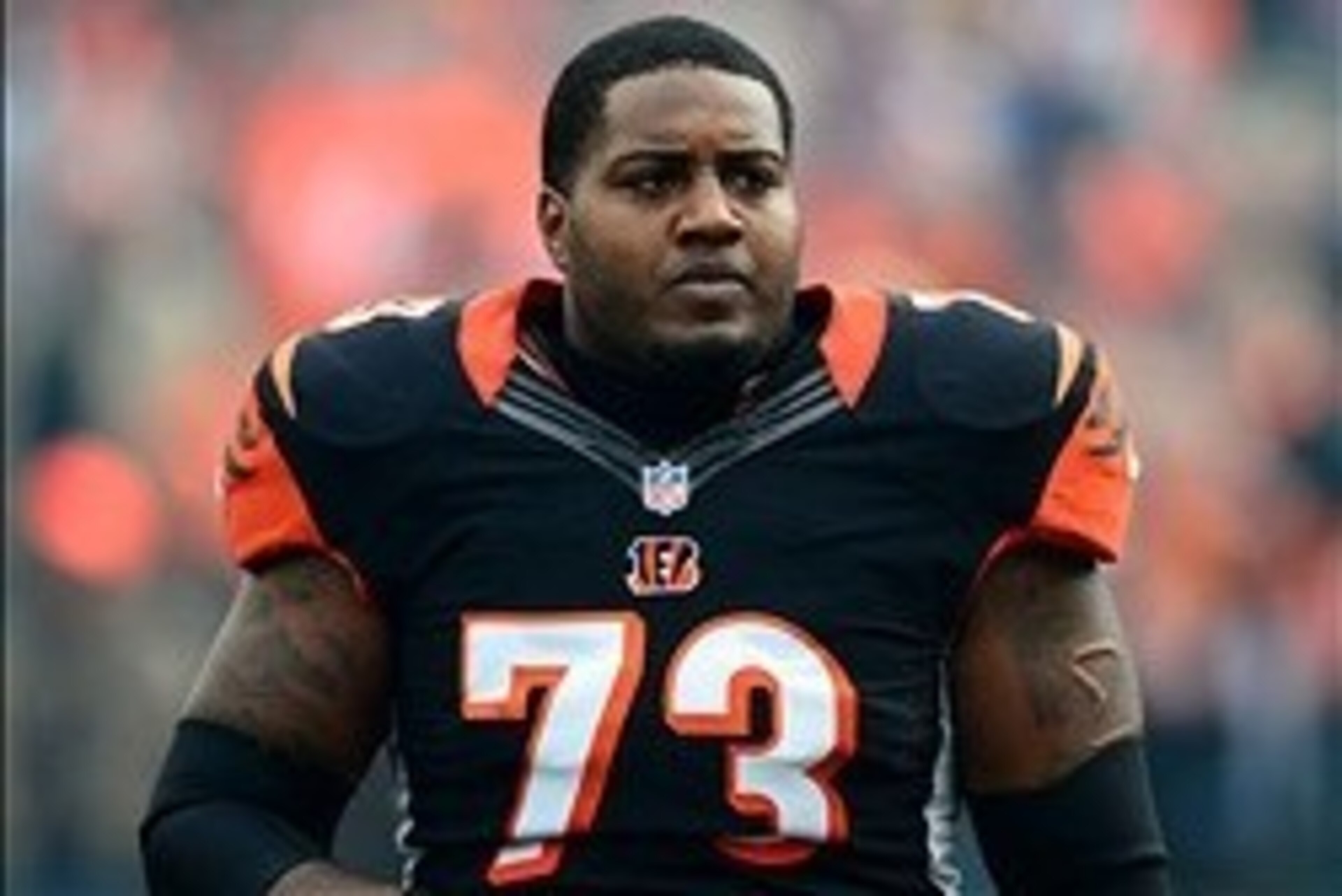Dec 29, 2013; Cincinnati, OH, USA; Cincinnati Bengals tackle Anthony Collins (73) against the Baltimore Ravens at Paul Brown Stadium. Bengals defeated the Ravens 34-17. Mandatory Credit: Andrew Weber-USA TODAY Sports