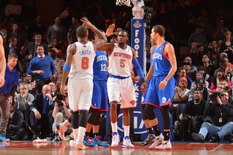 NEW YORK, NY - JANUARY 22: J.R. Smith #8 high fives Tim Hardaway Jr. #5 of the New York Knicks against the Philadelphia 76ers during the game on January 22, 2014 at Madison Square Garden in New York City, New York.   NOTE TO USER: User expressly acknowled