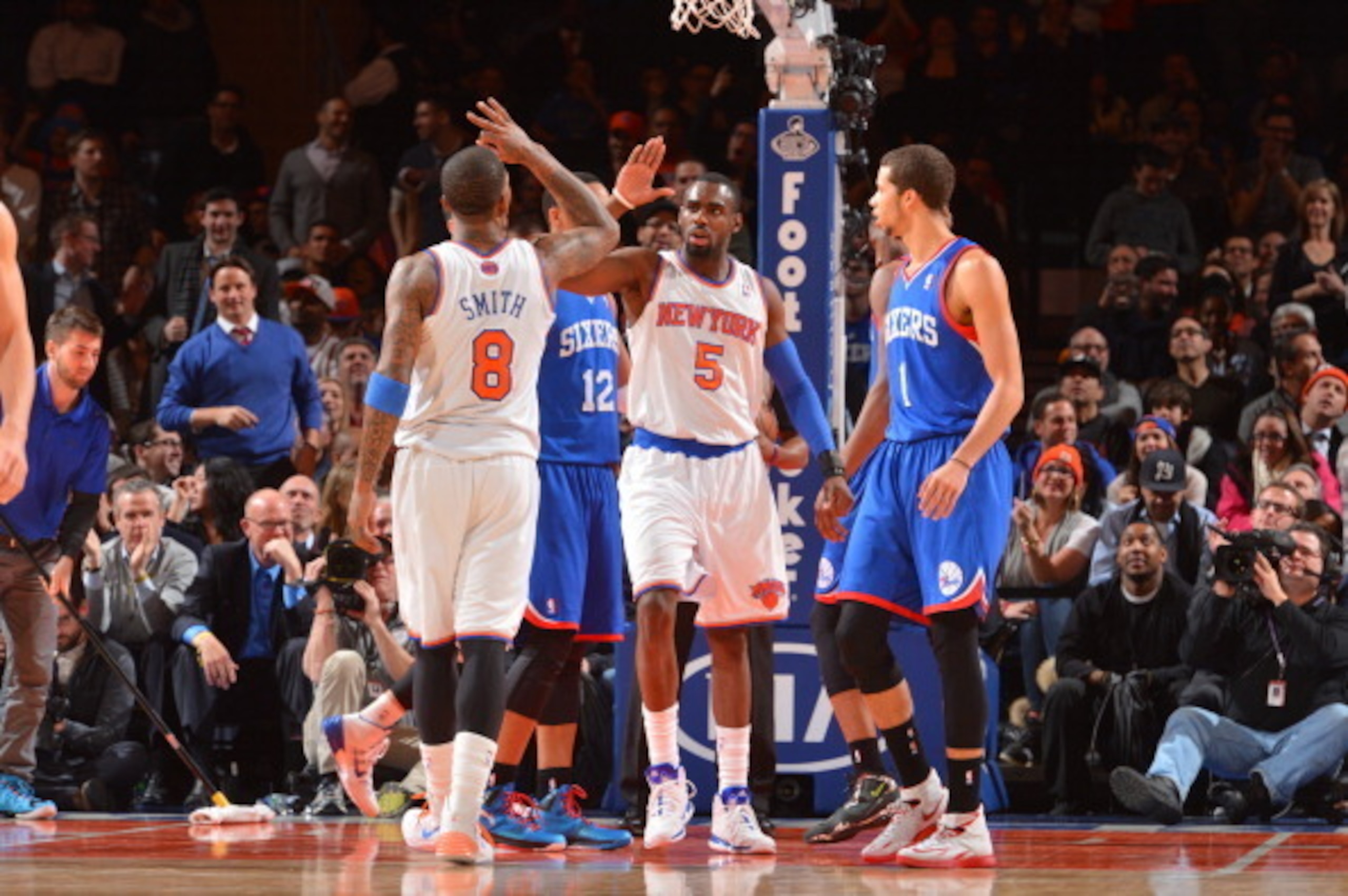 NEW YORK, NY - JANUARY 22: J.R. Smith #8 high fives Tim Hardaway Jr. #5 of the New York Knicks against the Philadelphia 76ers during the game on January 22, 2014 at Madison Square Garden in New York City, New York. NOTE TO USER: User expressly acknowled NEW YORK, NY - JANUARY 22: J.R. Smith #8 high fives Tim Hardaway Jr. #5 of the New York Knicks against the Philadelphia 76ers during the game on January 22, 2014 at Madison Square Garden in New York City, New York. NOTE TO USER: User expressly acknowled