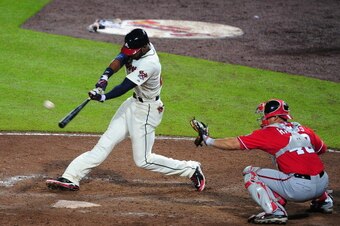 ATLANTA, GA - AUGUST 17: Jason Heyward #22 of the Atlanta Braves hits a two-run ninth inning home run to tie the game against the Washington Nationals at Turner Field on August 17, 2013 in Atlanta, Georgia. (Photo by Scott Cunningham/Getty Images)