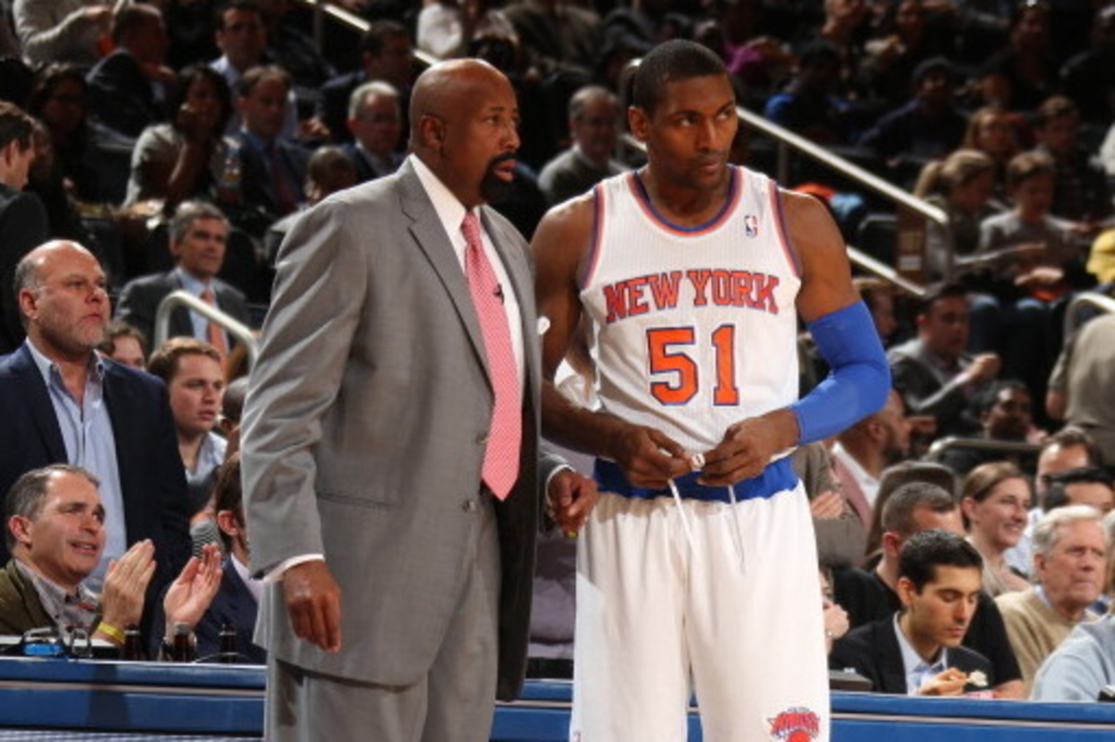 NEW YORK, NY - NOVEMBER 14: Head Coach, Mike Woodson of the New York Knicks shares a word with Metta World Peace #51 during a game against the Houston Rockets at Madison Square Garden in New York City on November 14, 2013.  NOTE TO USER: User expressly ac