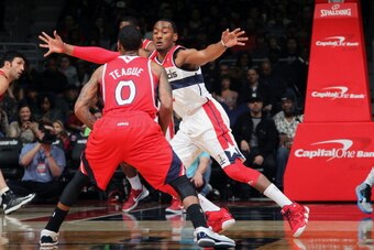 WASHINGTON, DC - JANUARY 12: John Wall #2 of the Washington Wizards defends against Jeff Teague #0 of the Atlanta Hawks during the game at the Verizon Center on January 12, 2013 in Washington, DC. NOTE TO USER: User expressly acknowledges and agrees that,
