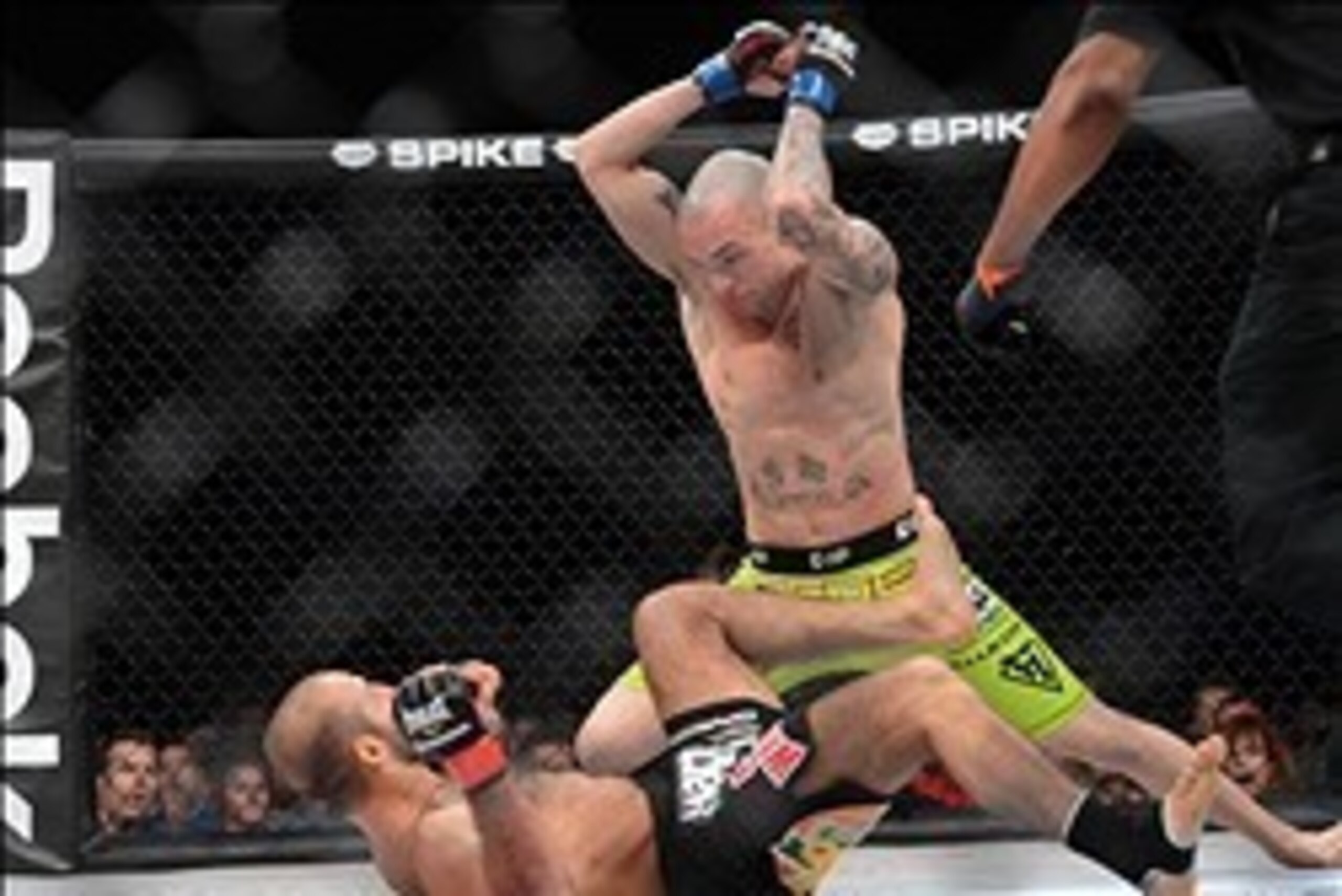 Nov 2, 2013; Long Beach, CA, USA;  Akop Stepanyan (red gloves) fights against Mike Richman (blue gloves) during a Bellator featherweight fight at the Long Beach Arena. Richman won the fight. Mandatory Credit: Jayne Kamin-Oncea-USA TODAY Sports