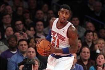 Jan 9, 2014; New York, NY, USA; New York Knicks shooting guard Iman Shumpert (21) controls the ball against the Miami Heat during the third quarter of a game at Madison Square Garden. Mandatory Credit: Brad Penner-USA TODAY Sports