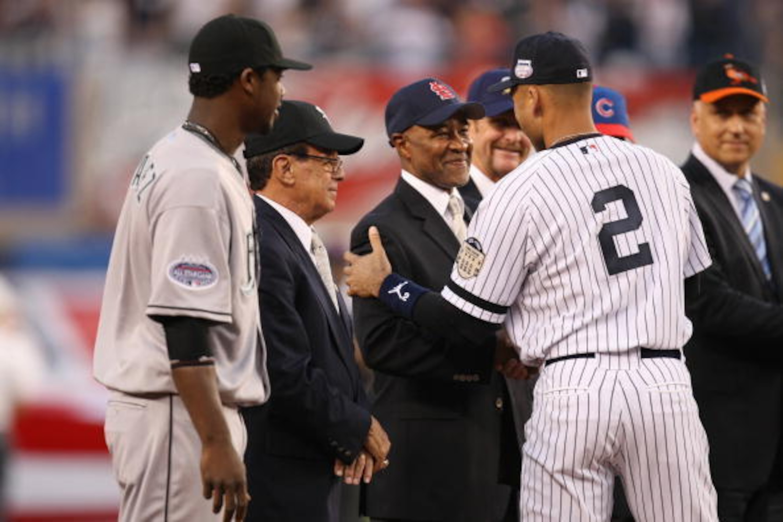 NEW YORK - JULY 15: Hall of Famer Ozzie Smith is greeted by American League All-Star and Yankee Derek Jeter in a pre-game ceremony during the 79th MLB All-Star Game at Yankee Stadium on July 15, 2008 in New York, New York. (Photo by Nick Laham/Getty Imag NEW YORK - JULY 15: Hall of Famer Ozzie Smith is greeted by American League All-Star and Yankee Derek Jeter in a pre-game ceremony during the 79th MLB All-Star Game at Yankee Stadium on July 15, 2008 in New York, New York. (Photo by Nick Laham/Getty Imag