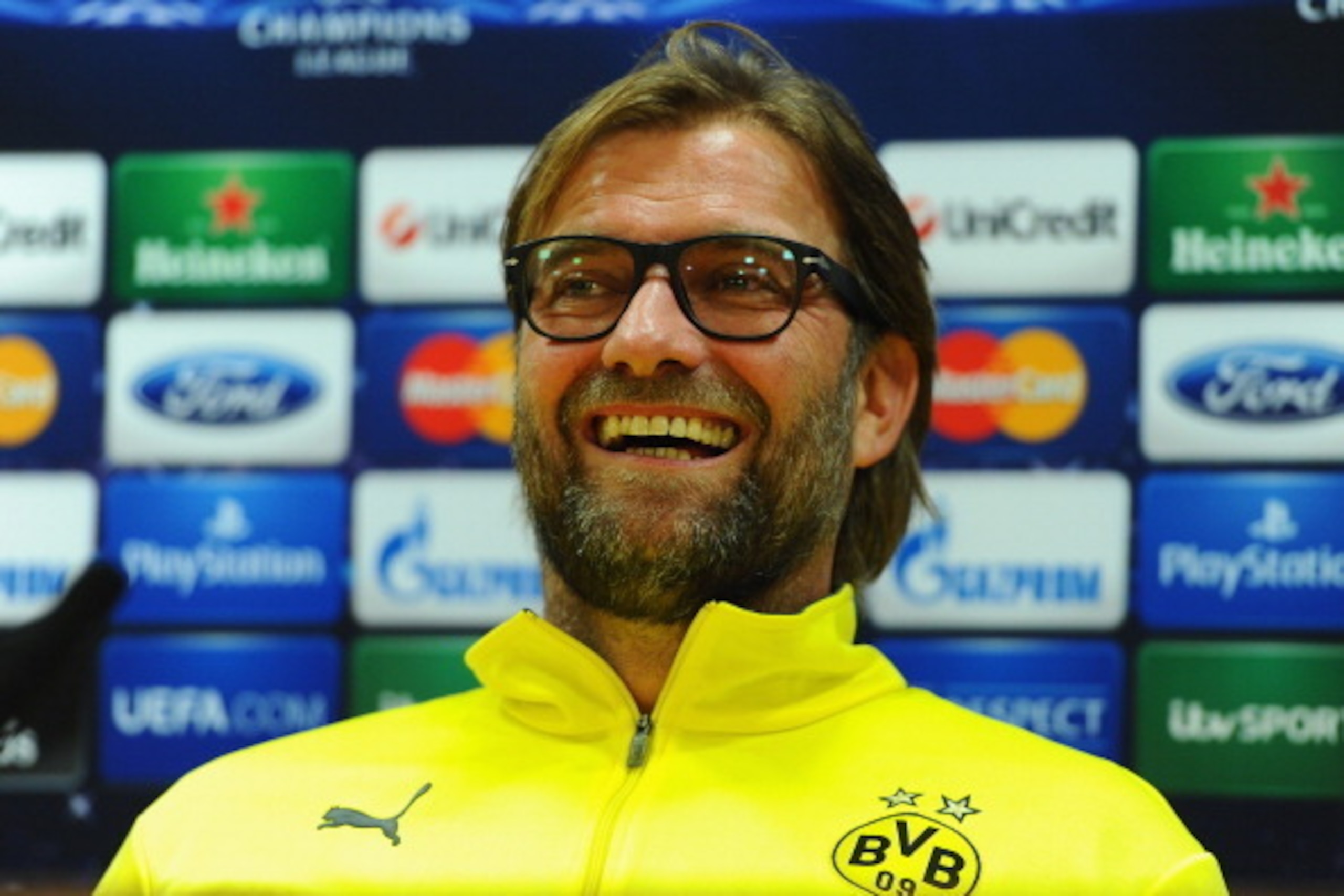LONDON, ENGLAND - OCTOBER 21: Borussia Dortmund coach Jurgen Klopp faces the media during a Borussia Dortmund press conference ahead of the UEFA Champions League Group F match against Arsenal at Emirates Stadium on October 21, 2013 in London, England. ( LONDON, ENGLAND - OCTOBER 21: Borussia Dortmund coach Jurgen Klopp faces the media during a Borussia Dortmund press conference ahead of the UEFA Champions League Group F match against Arsenal at Emirates Stadium on October 21, 2013 in London, England. (
